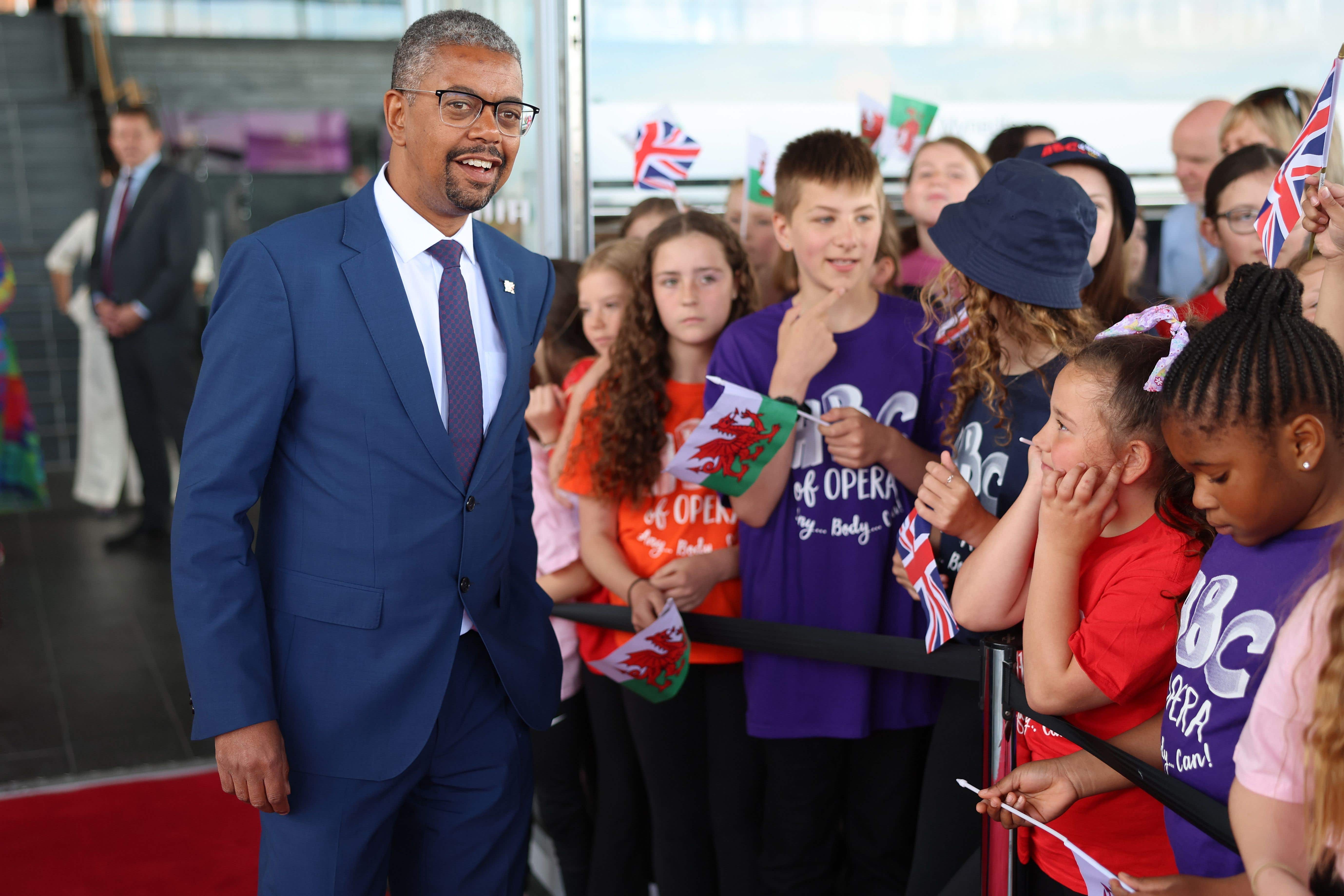 First Minister of Wales, Vaughan Gething, with a group of schoolchildren (Chris Jackson/PA)