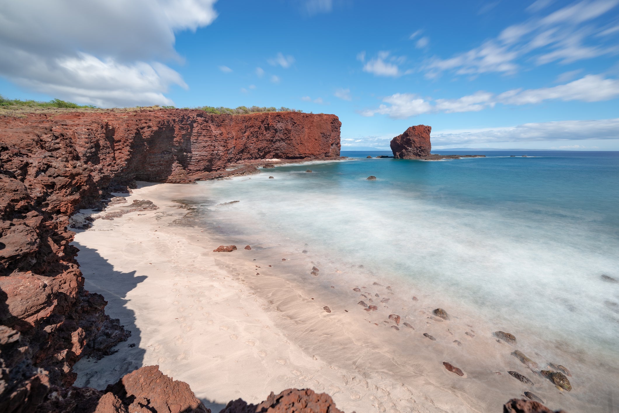 Watch the sun rise over Maui from the cliffs by Sweetheart Rock