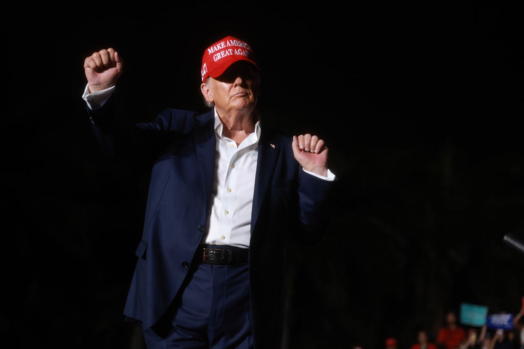 Donald Trump dances onstage during his July 9, 2024, campaign rally at his golf resort in Miami, Florida