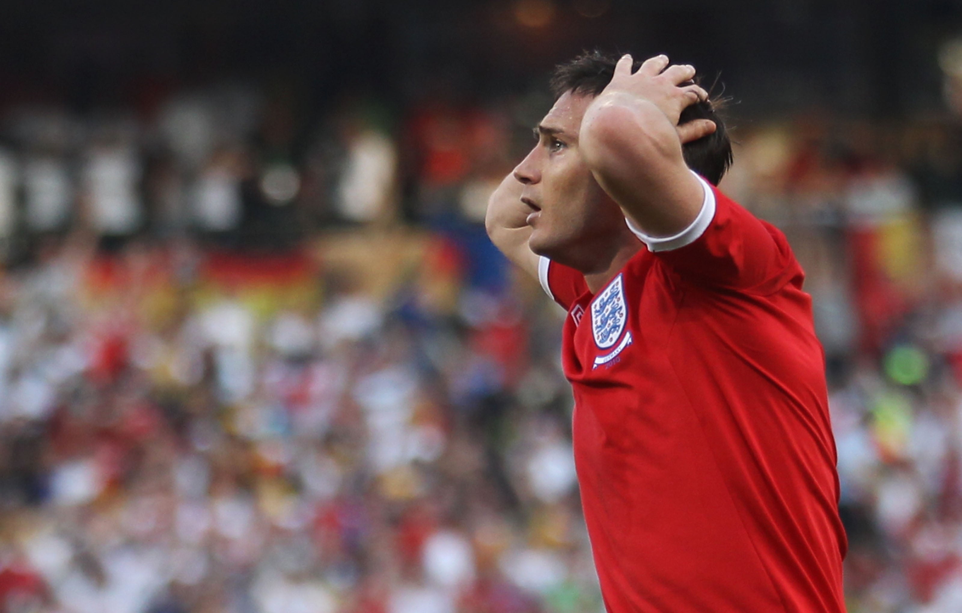 Frank Lampard of England is stunned after his goal is disallowed