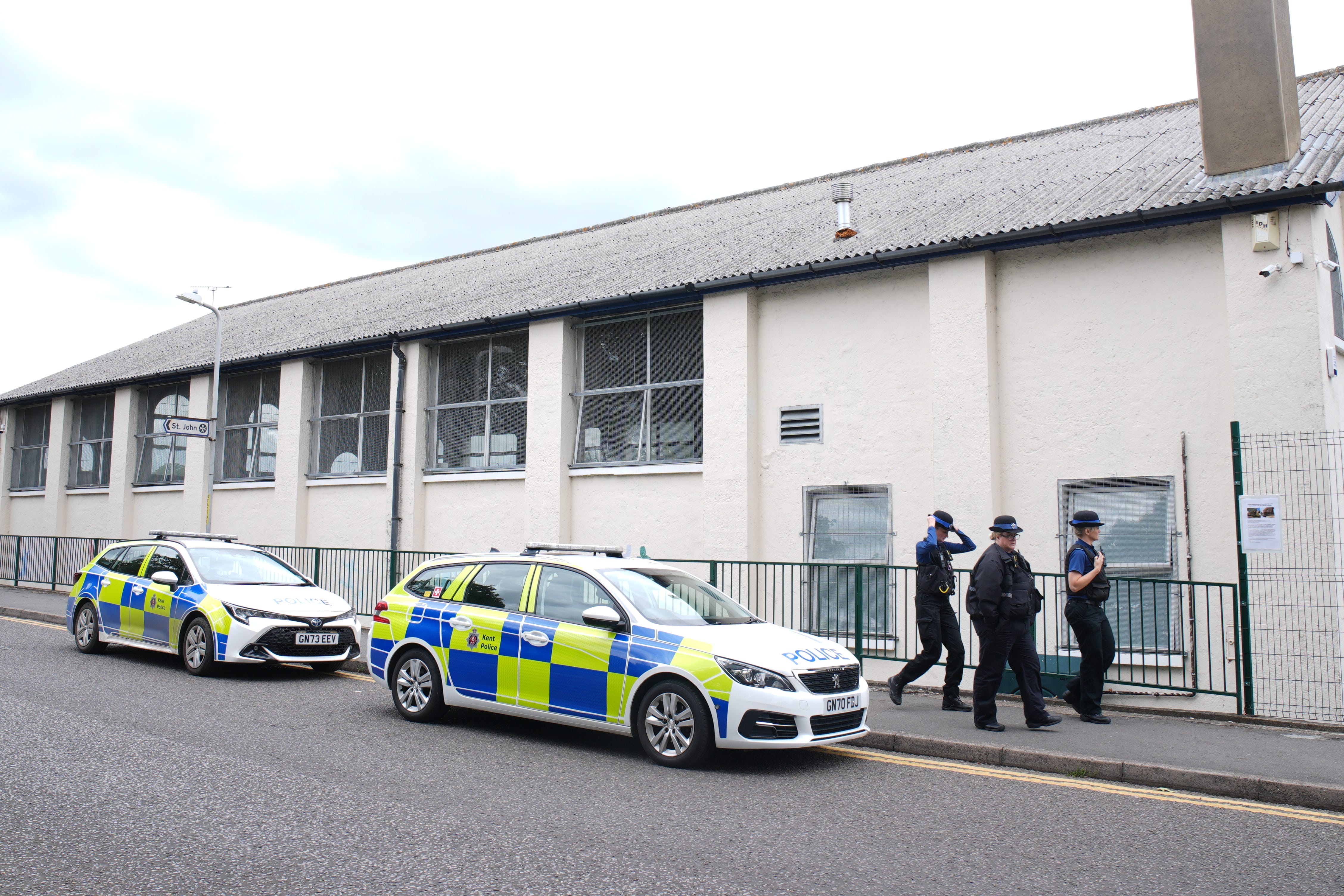 Police cars near Siri Guru Nanak Darbar Gurdwara temple in Gravesend (Gareth Fuller/PA)