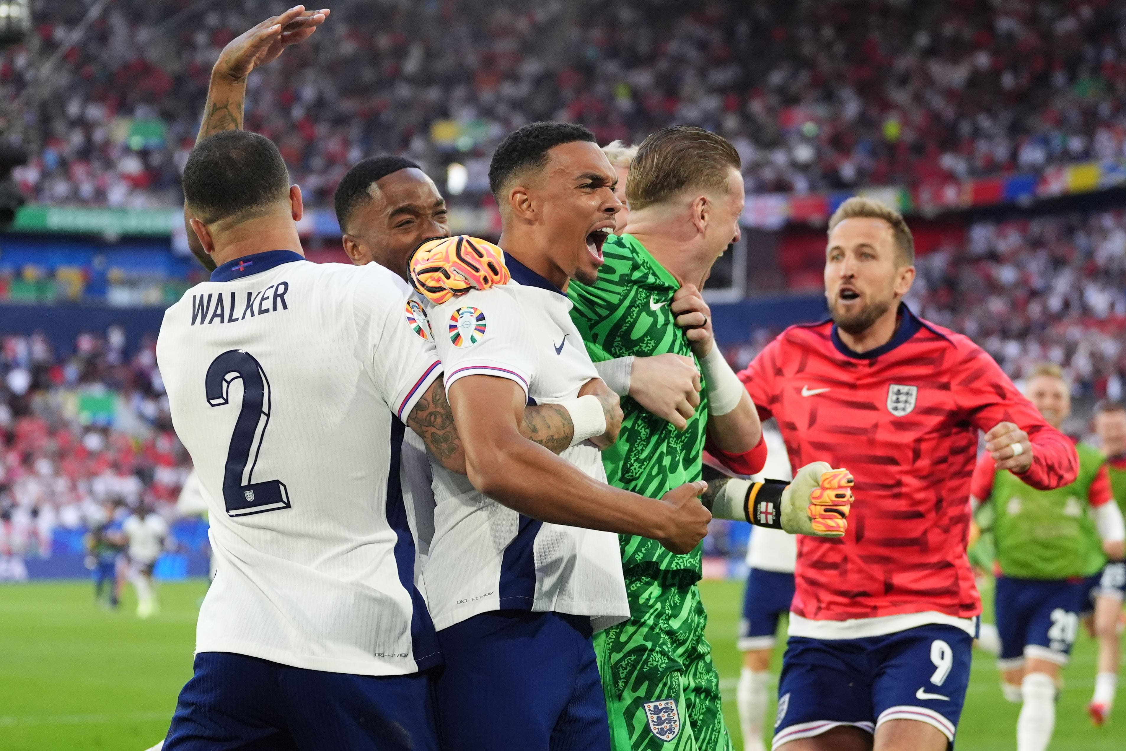 Trent Alexander-Arnold, centre, scored the winning penalty against Switzerland (Adam Davy/PA)