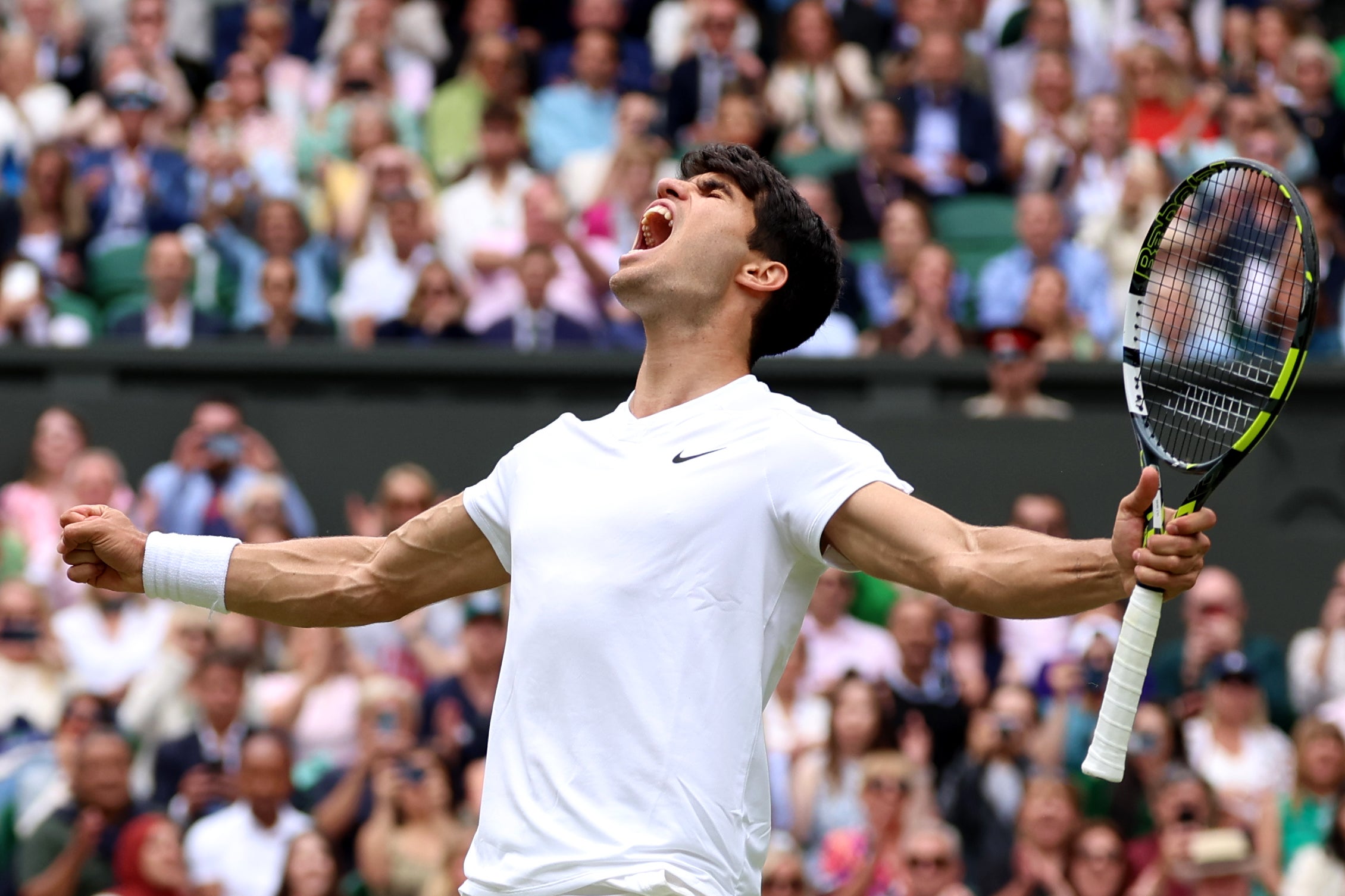 The defending champion celebrates sealing his spot in Sunday’s final