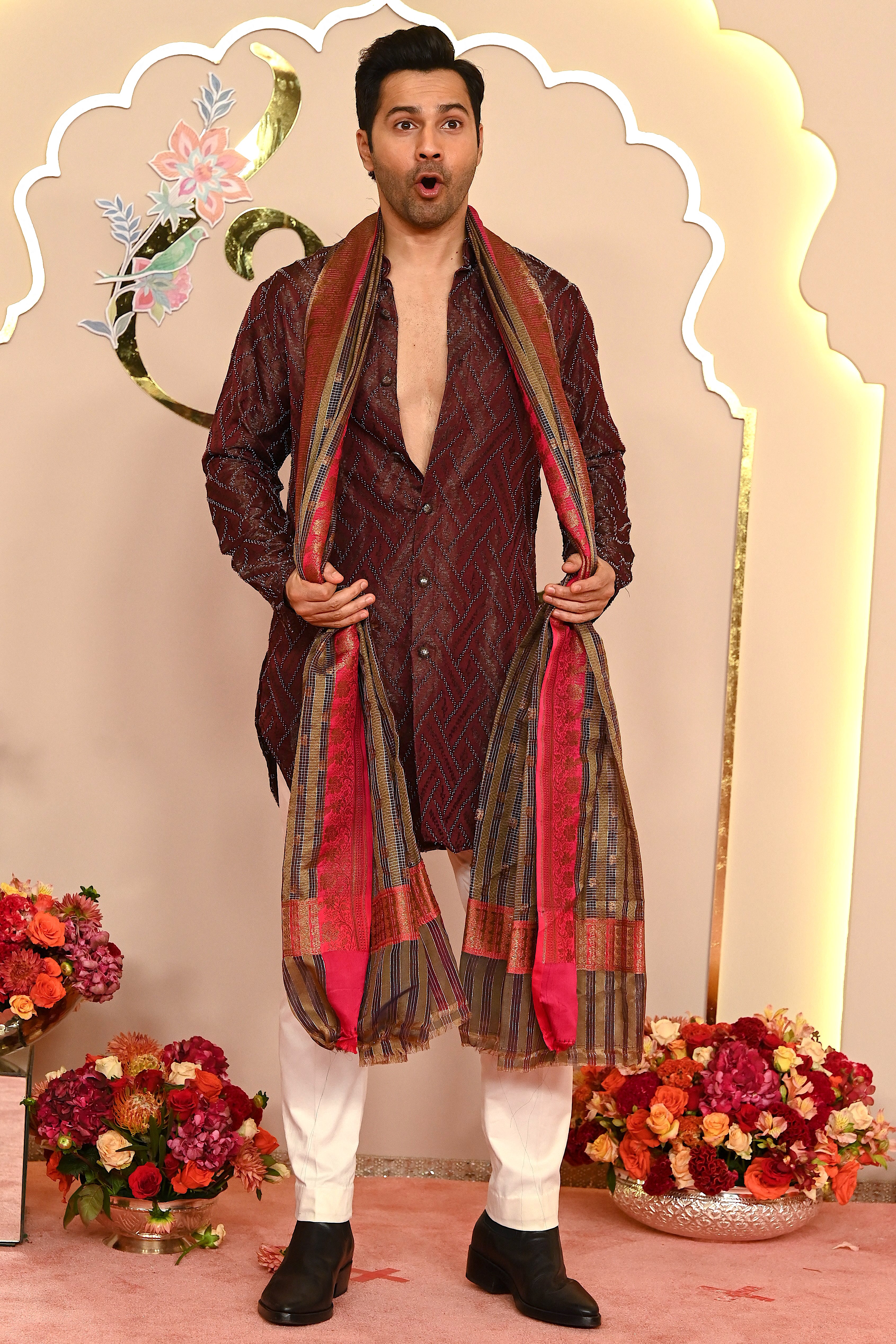 Dhawan dons a maroon kurta at the Ambani wedding