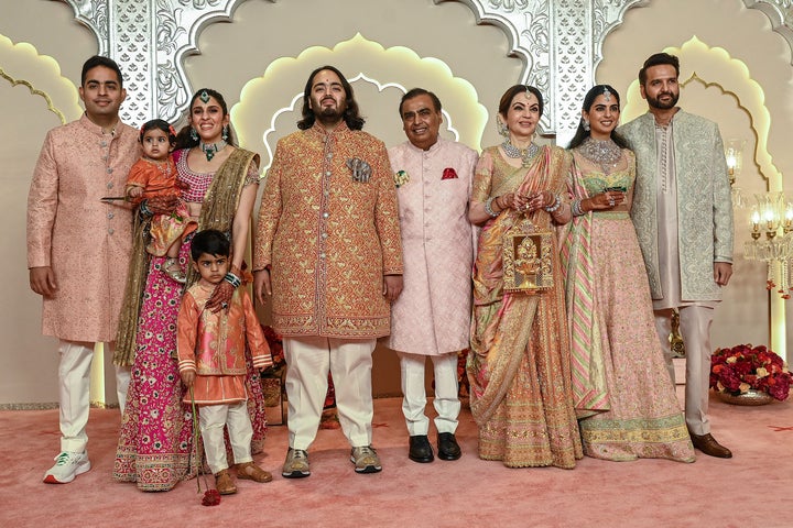 Anant Ambani poses with his family at his wedding