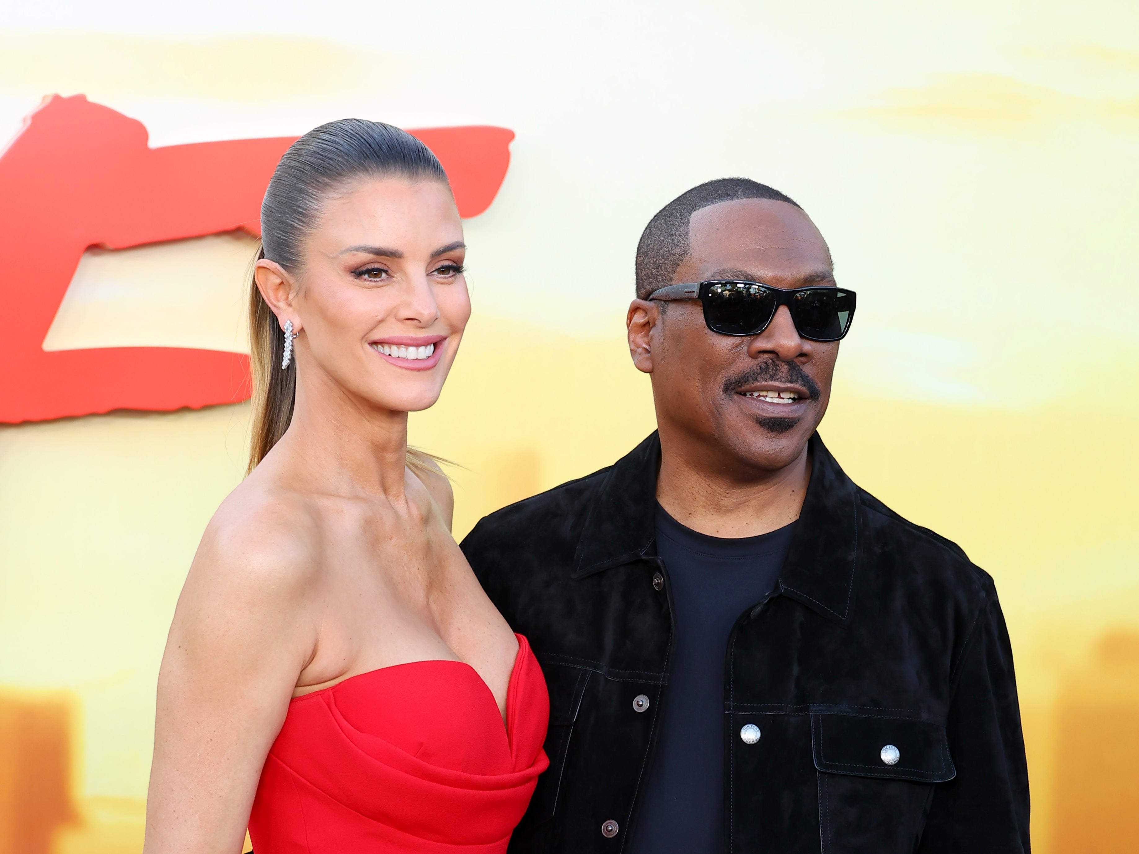 Paige Butcher and Eddie Murphy attend the Los Angeles Premiere Of Netflix’s ‘Beverly Hills Cop: Axel F’ at Wallis Annenberg Center for the Performing Arts on 20 June 2024 in Beverly Hills, California