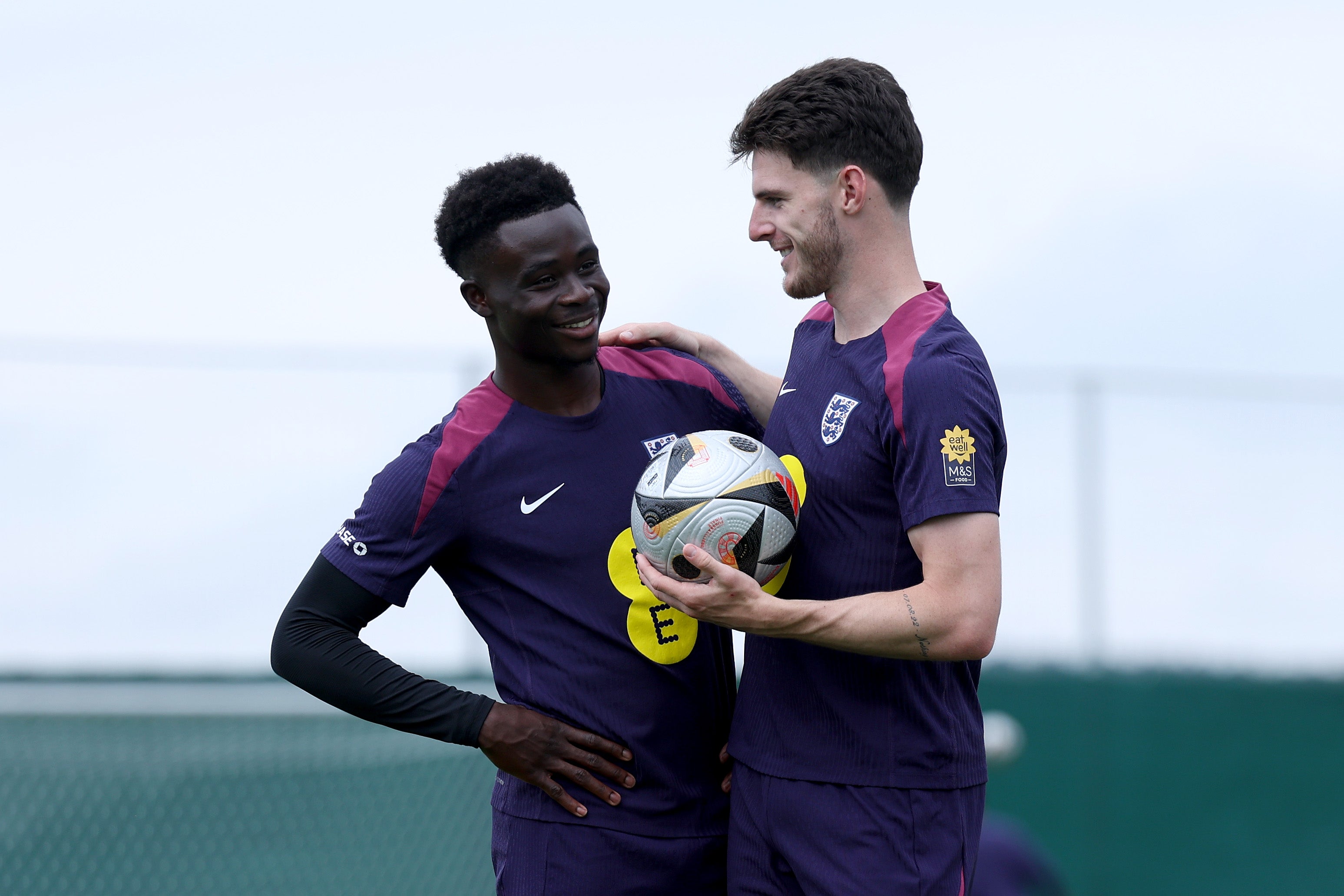 Bukayo Saka and Declan Rice during a training session