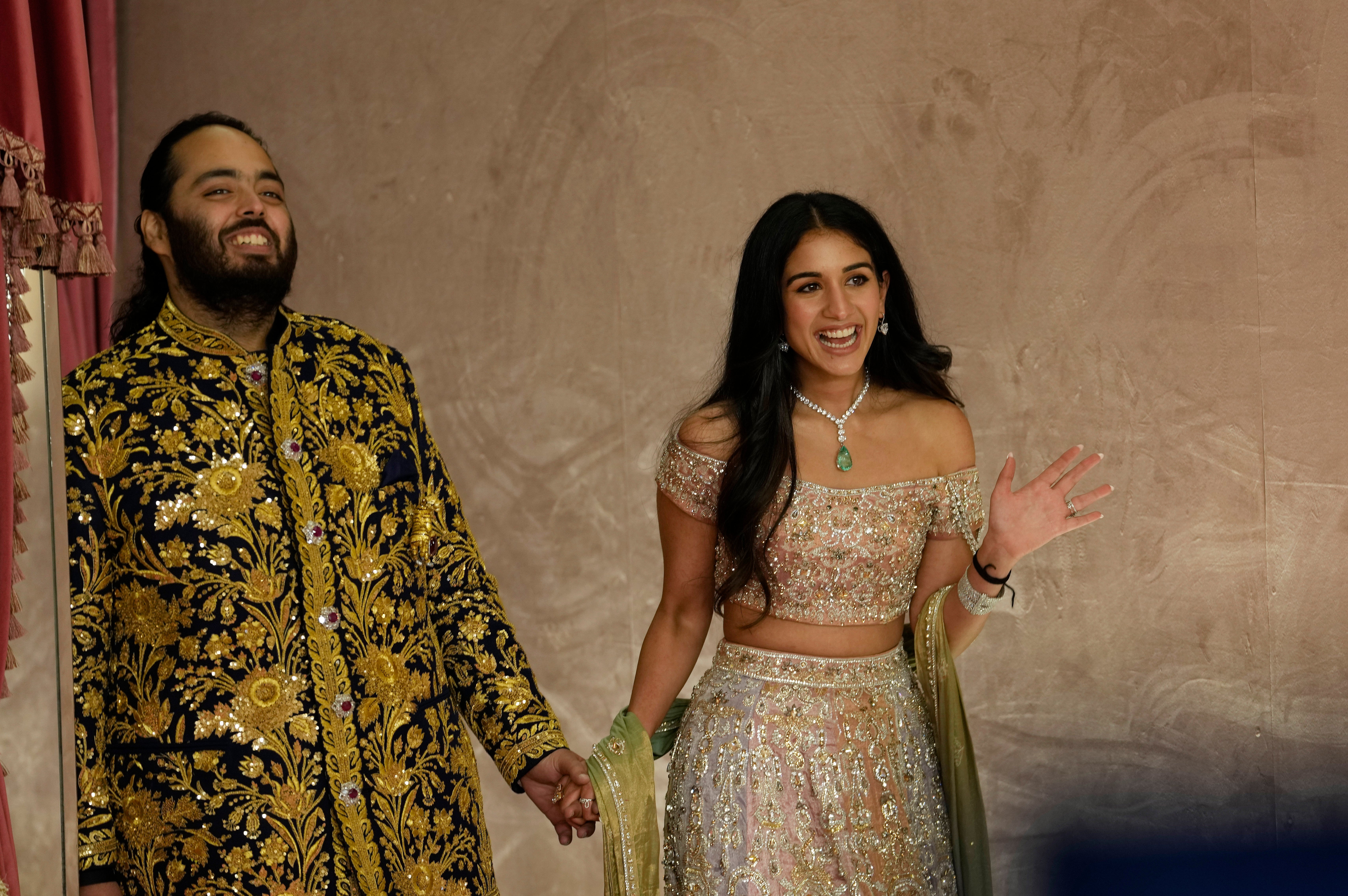 Anant Ambani, left, and Radhika Merchant during their pre-wedding ceremony in Mumbai