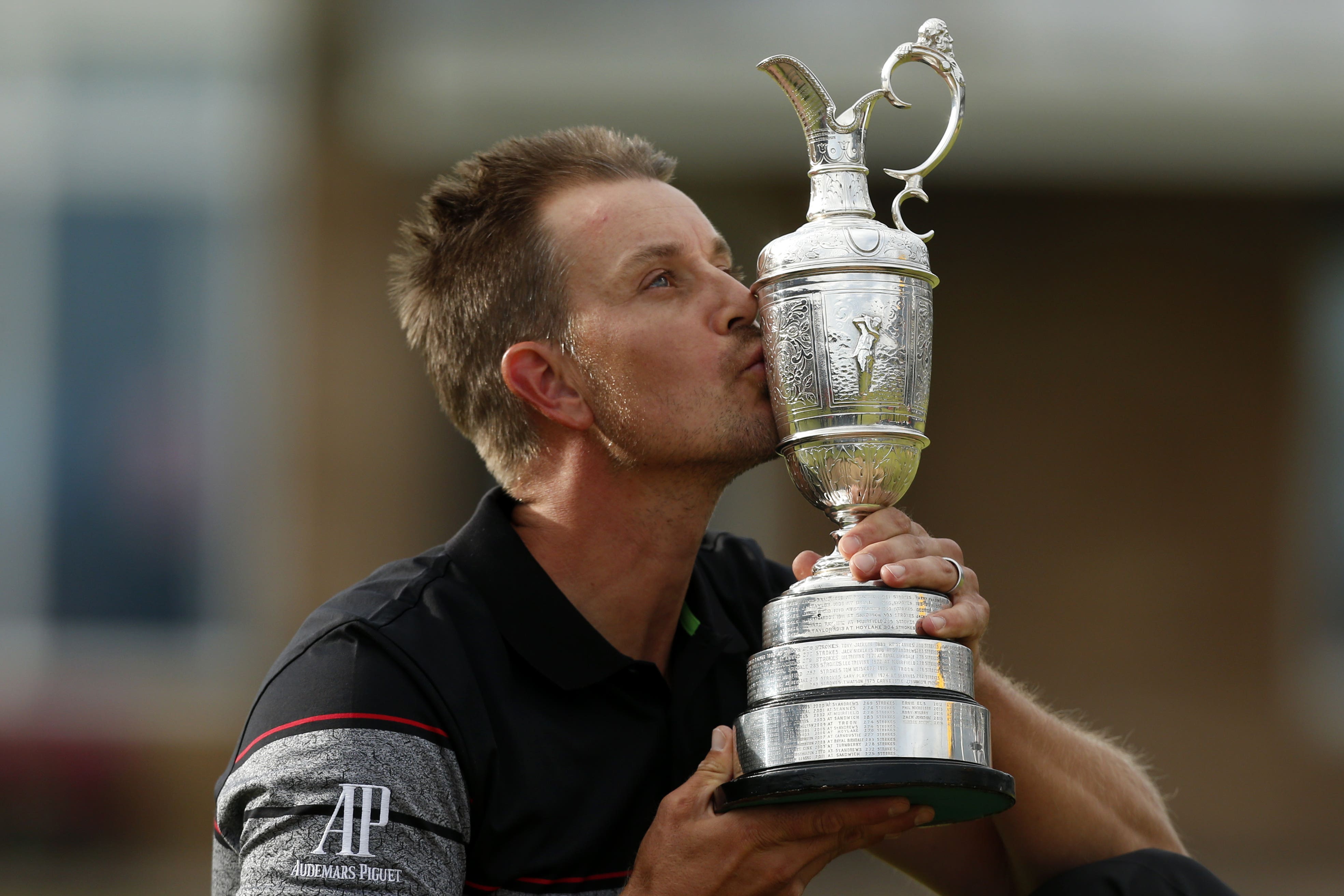 Sweden’s Henrik Stenson celebrates with the Claret Jug after winning the 2016 Open Championship at Royal Troon (Danny Lawson/PA)