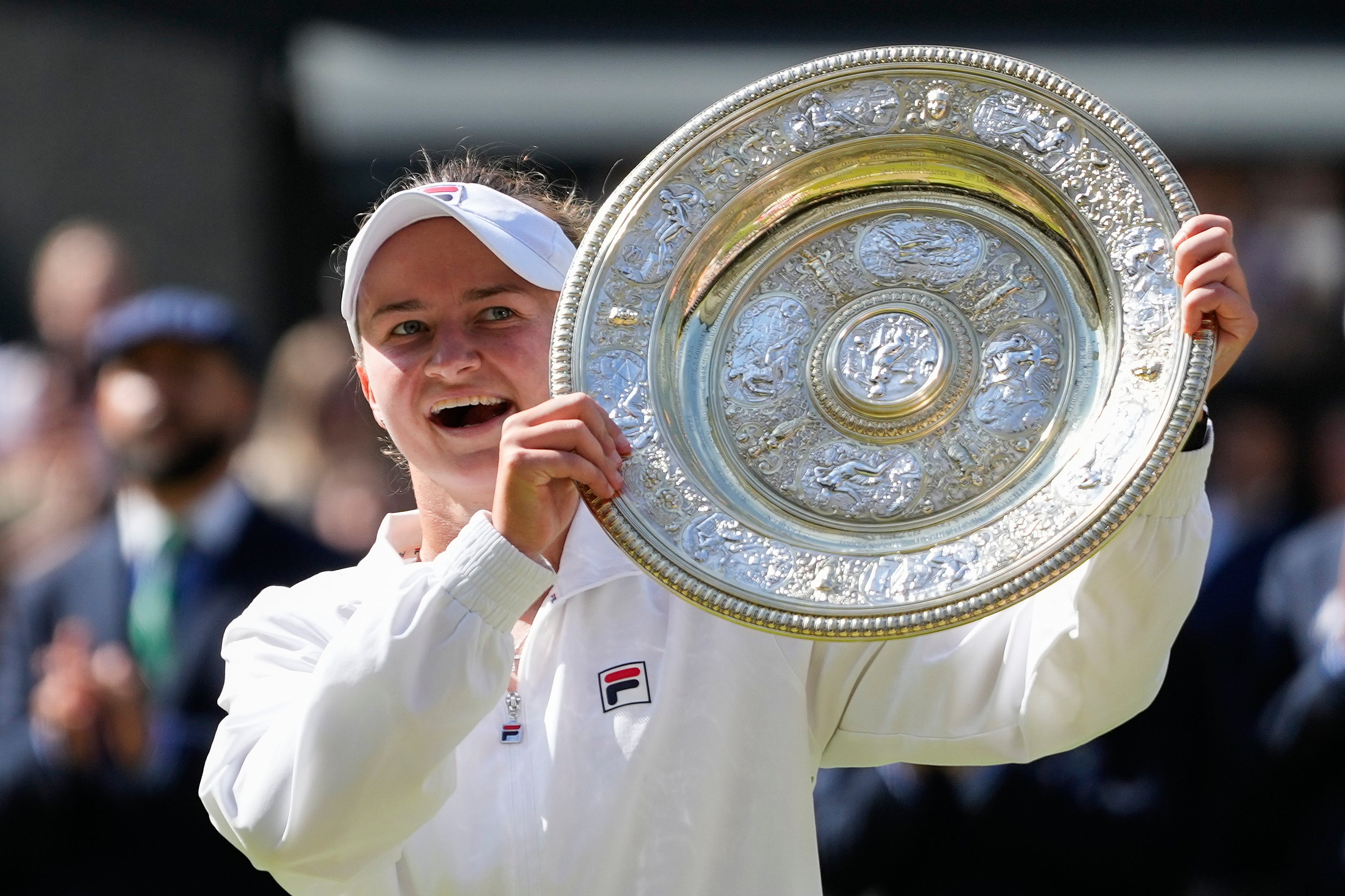 Barbora Krejcikova of the Czech Republic holds her trophy aloft