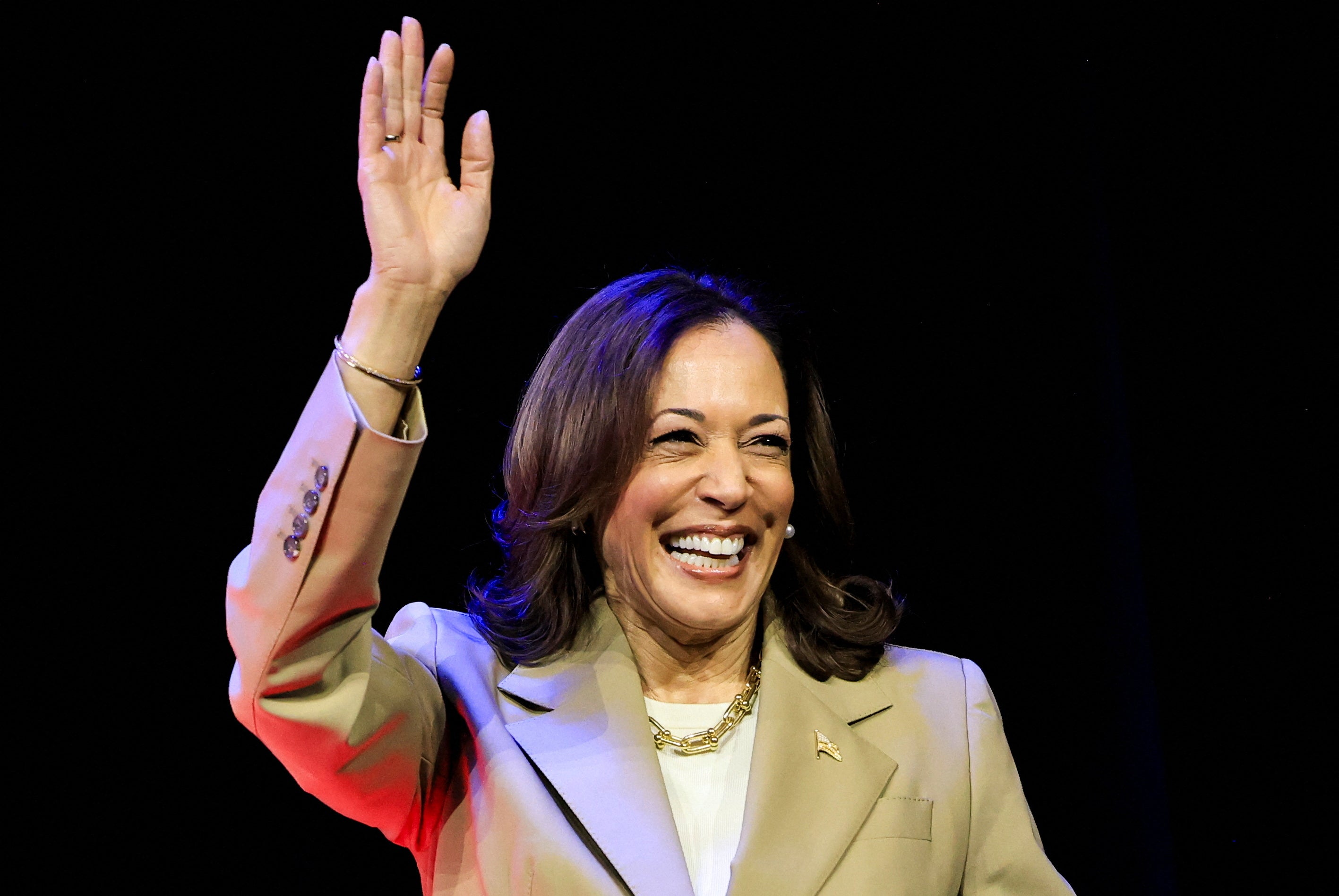 Vice President Kamala Harris waves as she attends an Asian and Pacific Islander American Vote presidential town hall in Philadelphia on July 13