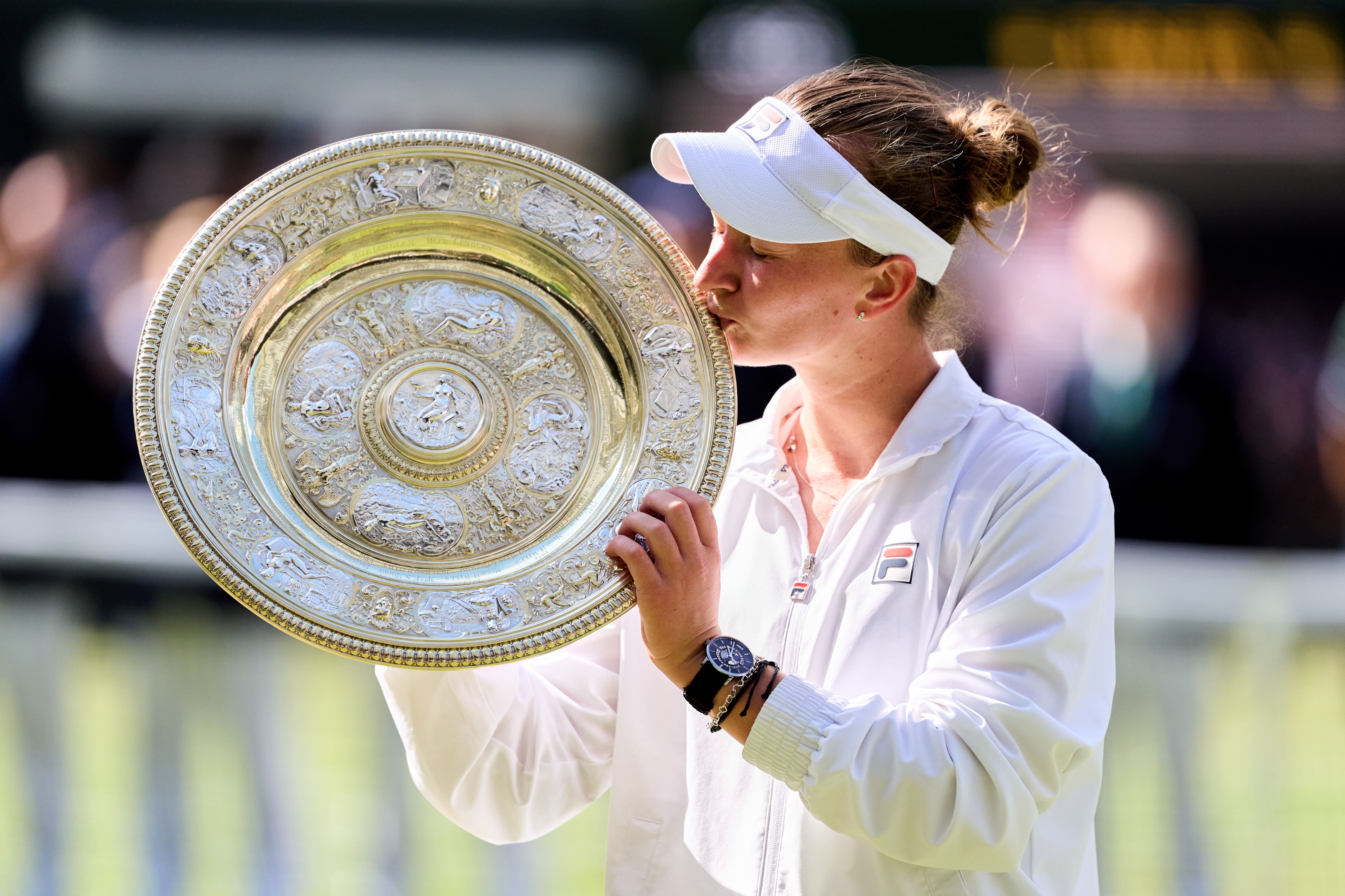 Barbora Krejcikova poses with the Venus Rosewater Dish after beating Jasmine Paolini in the Ladies Singles final on day thirteen of the 2024 Wimbledon Championships at the All England Lawn Tennis and Croquet Club, London. Picture date: Saturday July 13, 2024.