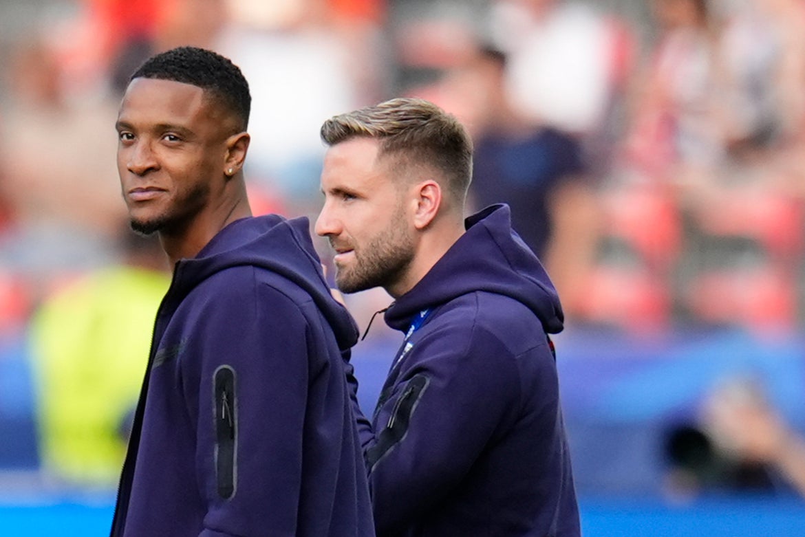 Luke Shaw inspects the pitch ahead of the Euro 2024 final