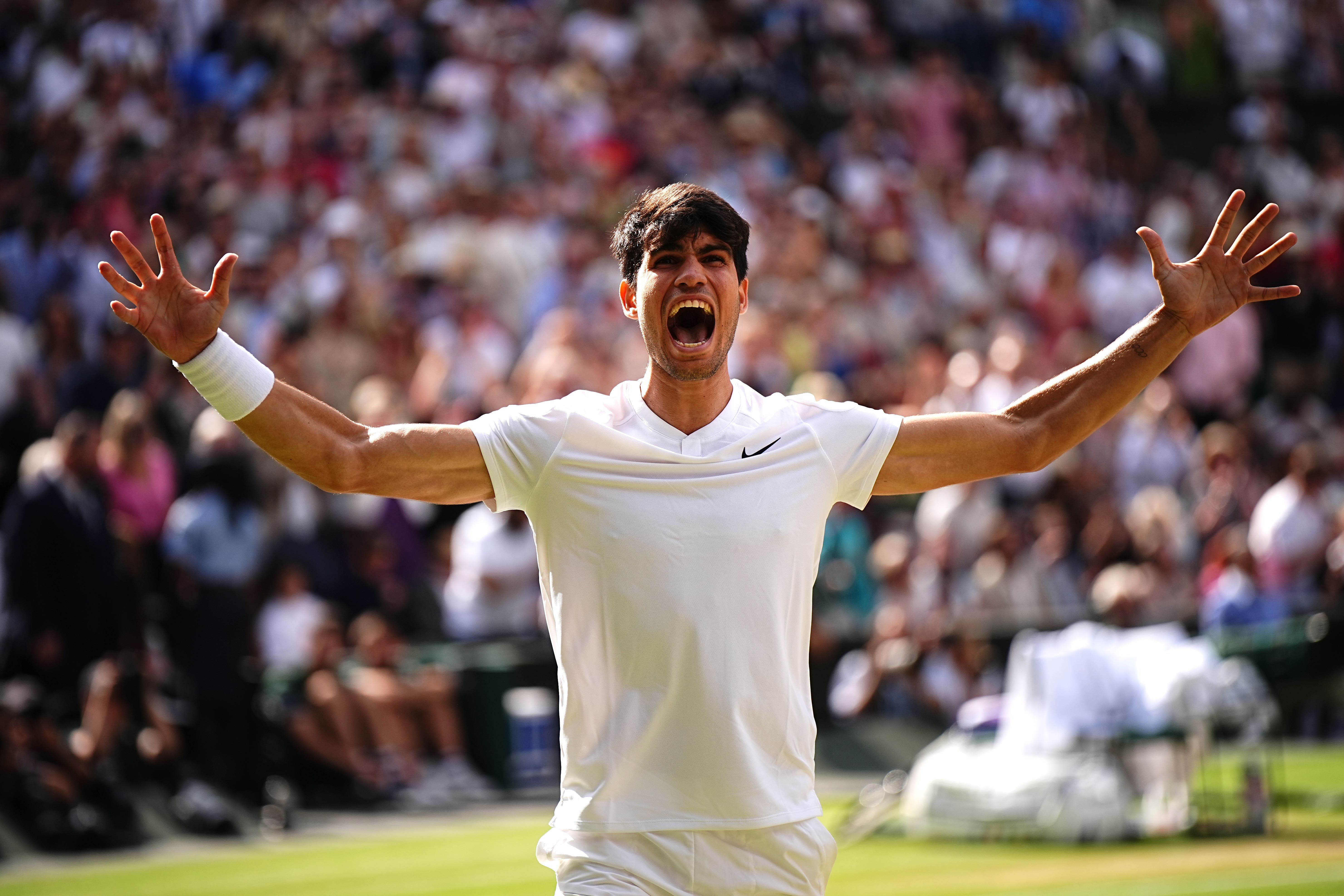 Carlos Alcaraz celebrates victory (Aaron Chown/PA)