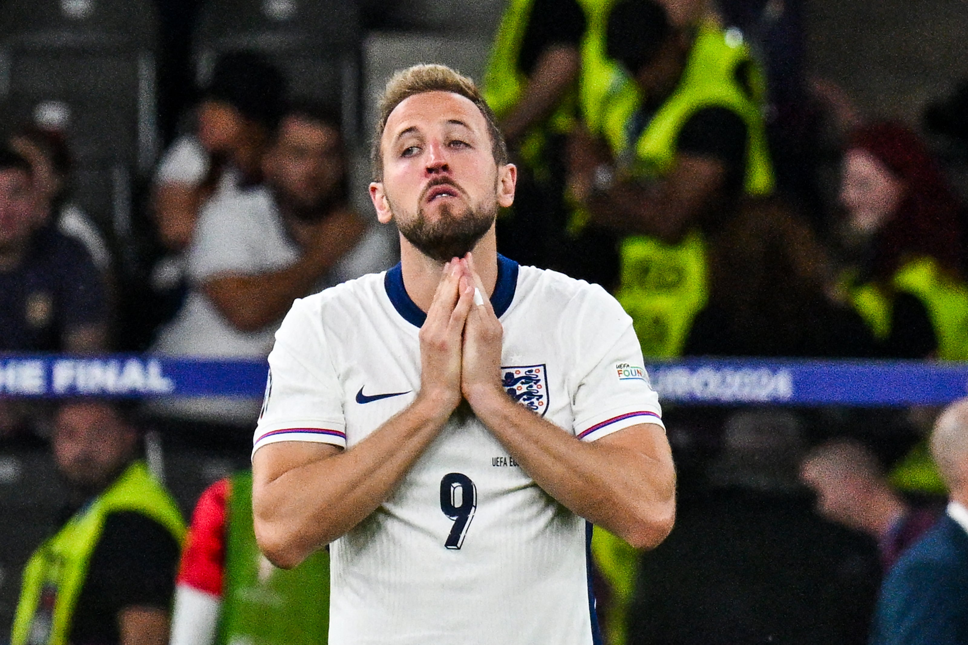 England’s forward Harry Kane reacts after losing