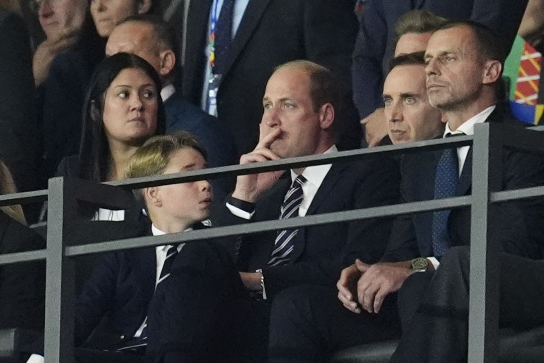 Prince George and the Prince of Wales in the stands after Spain scored their second goal (Nick Potts/PA)