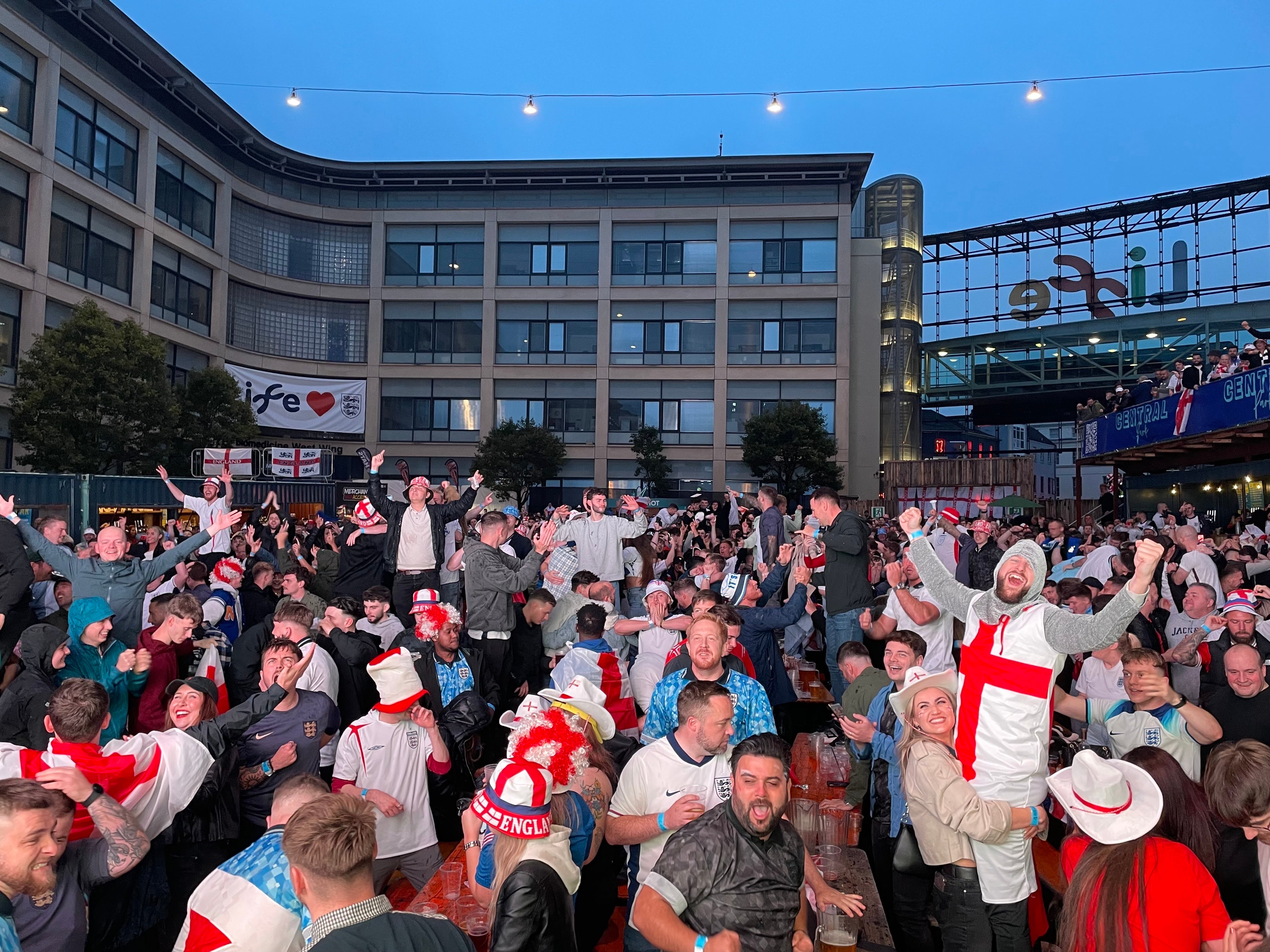 England fans cheer after Cole Palmer equalises during the Euro Finals at the Newcastle fan zone