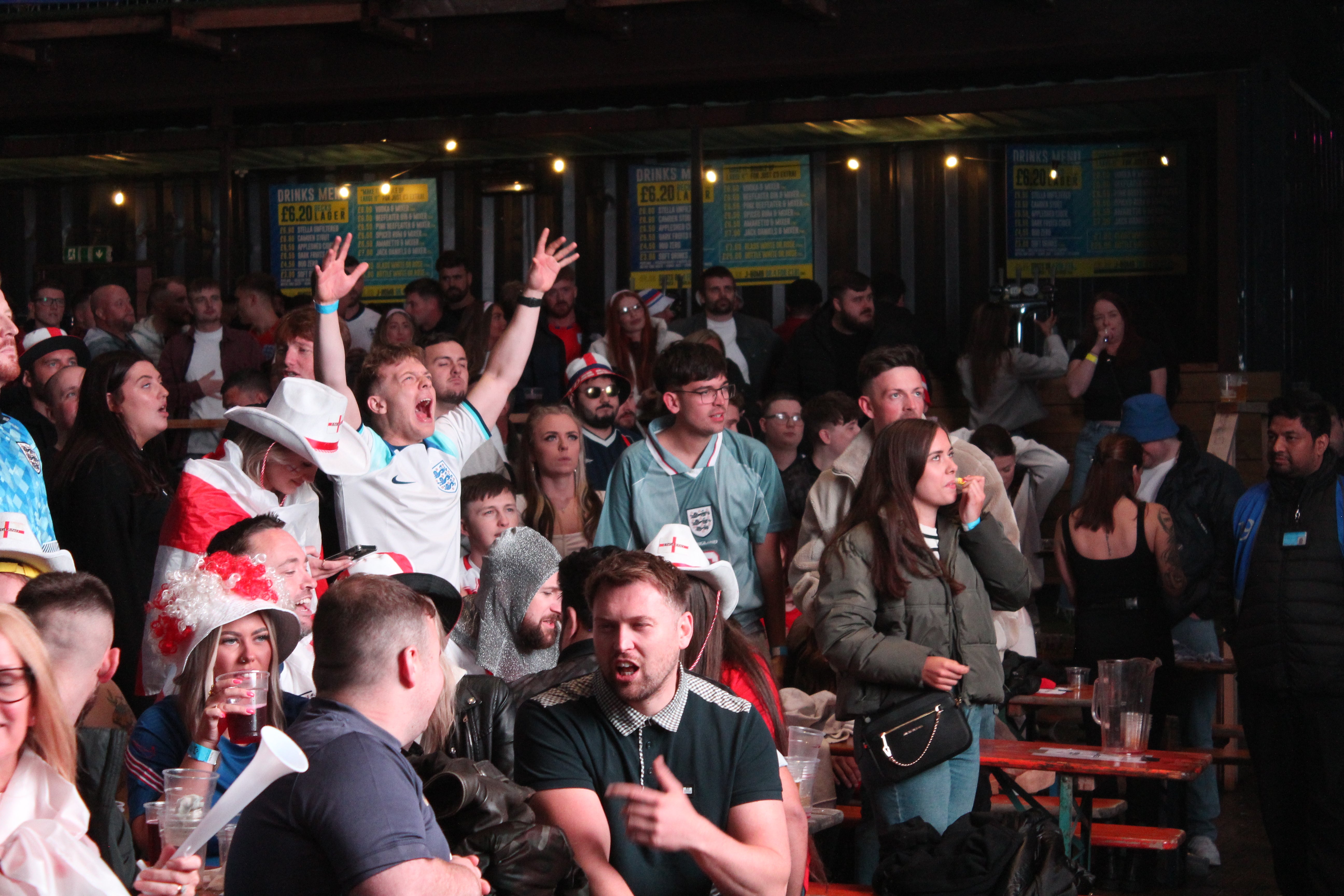 England fans react as Spain scores a second goal and the end of the Three Lions’ dream seems imminent