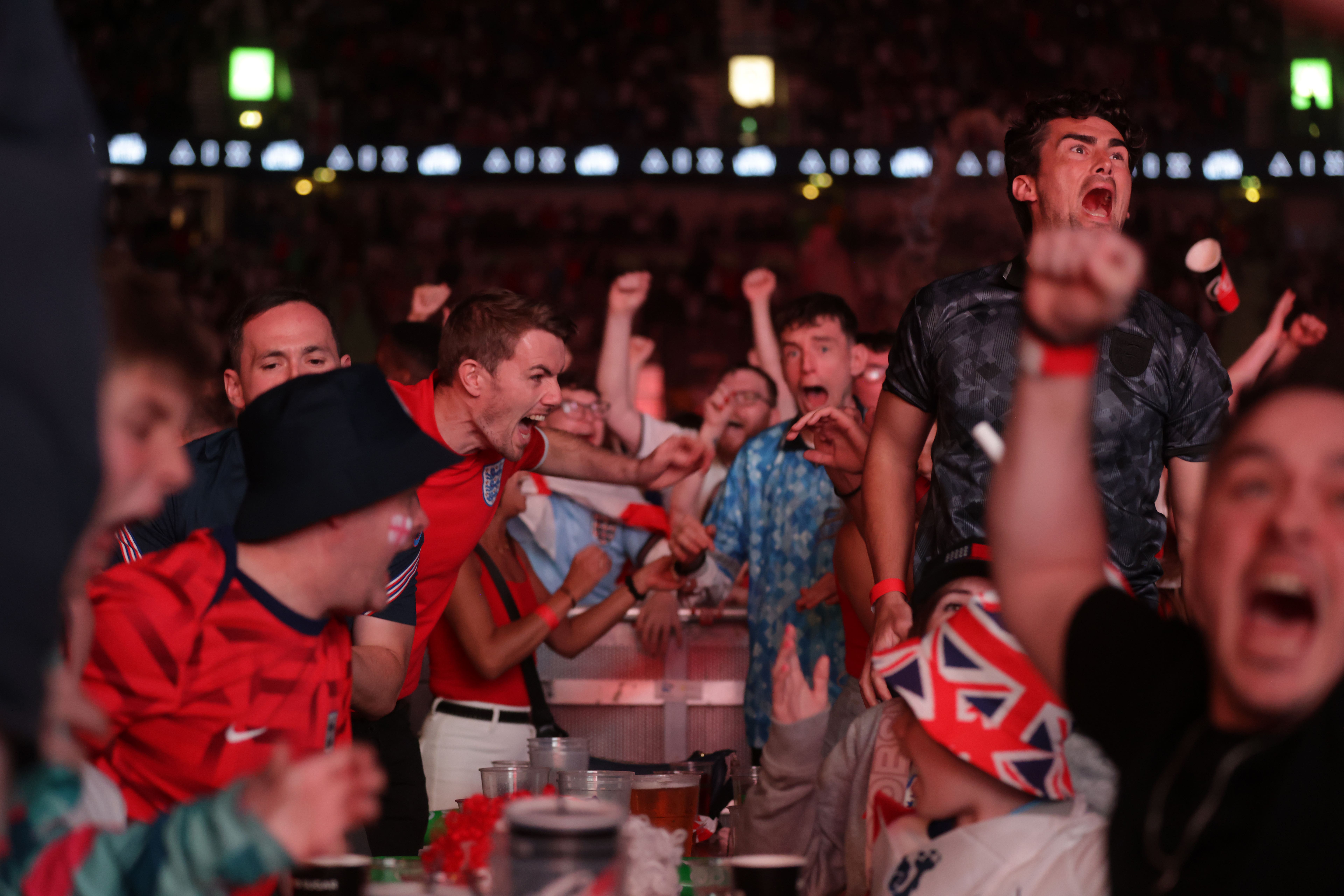 Euro 2024 fans celebrating the football in Germany (Gareth Fuller/PA)