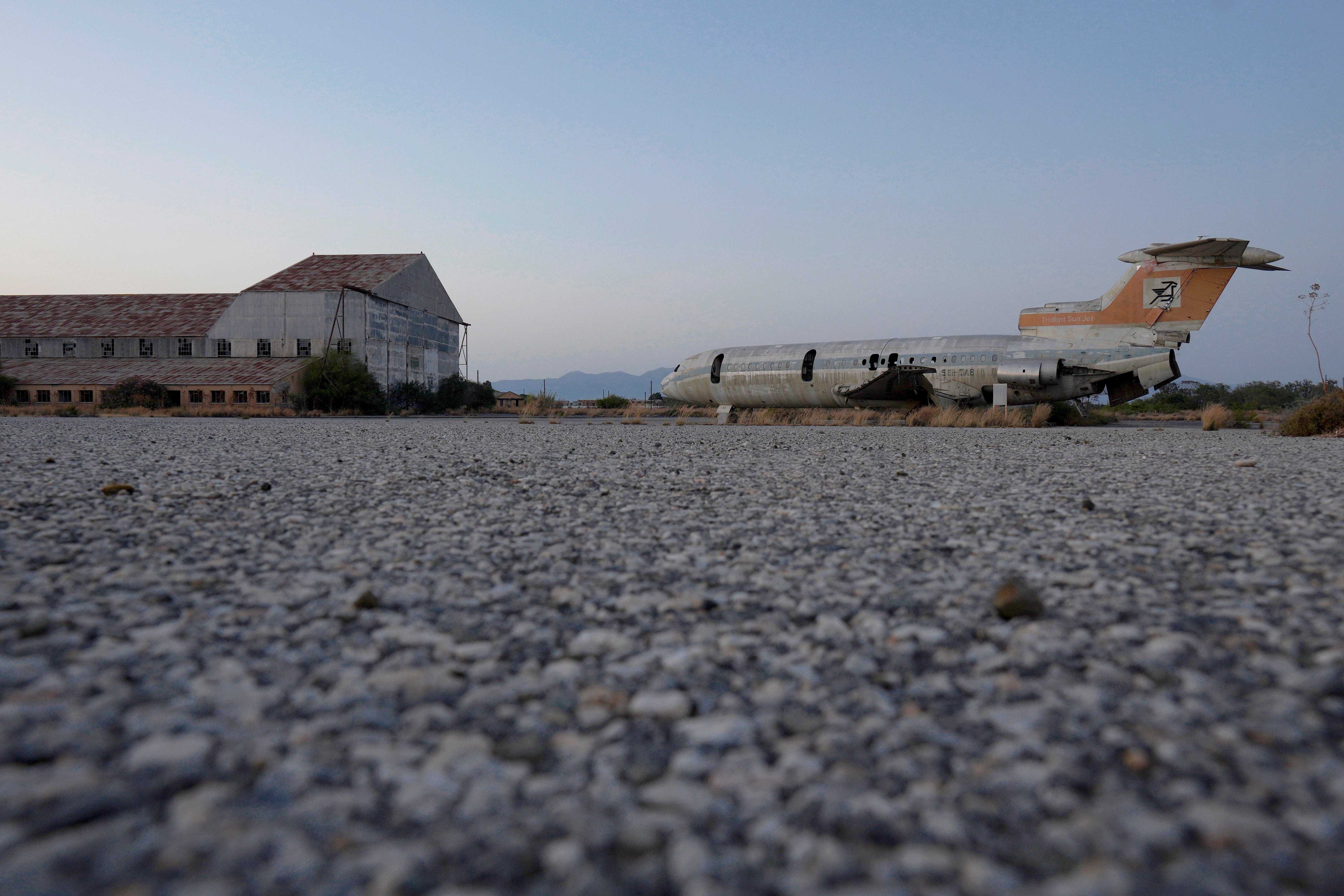 A destroyed Cyprus airways plane is seen at the war-torn U.N. buffer zone at the abandoned Nicosia airport