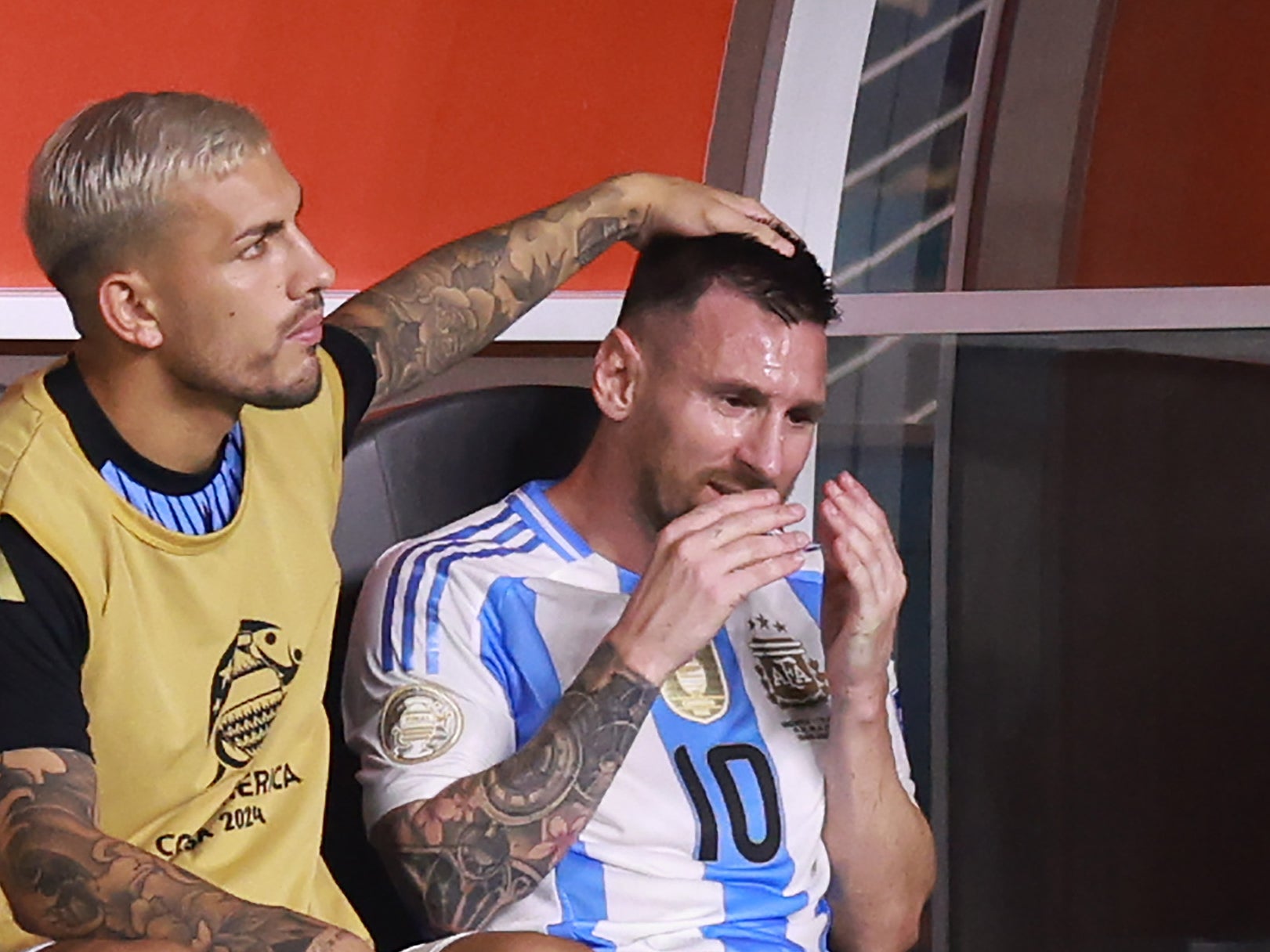 Lionel Messi of Argentina reacts after an injury