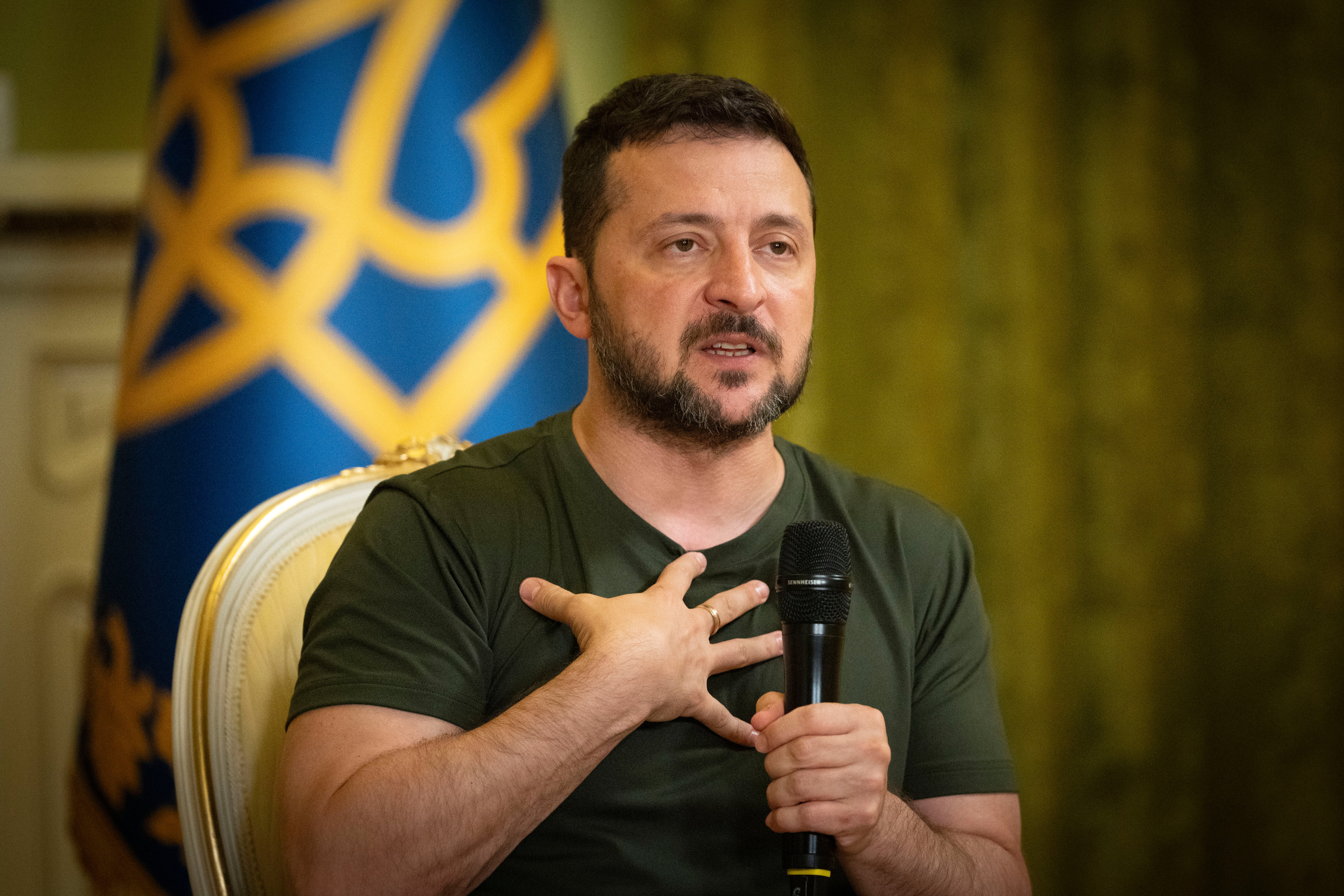 Ukrainian President Volodymyr Zelensky speaks during a press conference in Kyiv