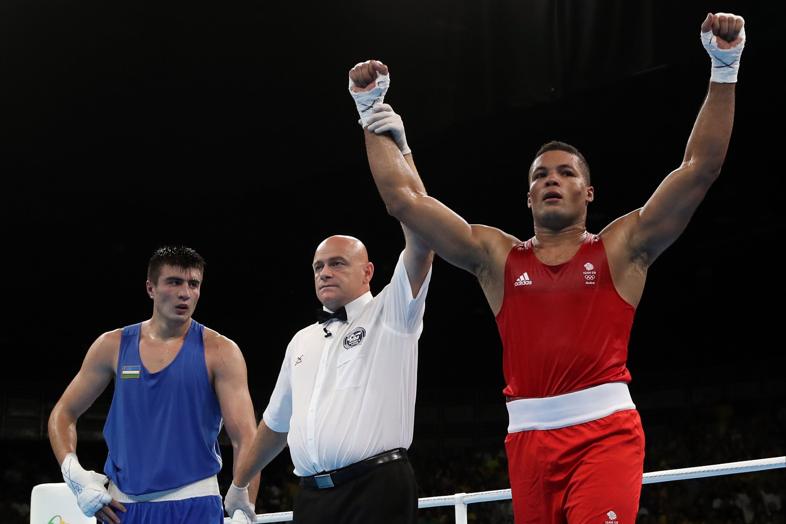 Joe Joyce (right) after defeating Bakhodir Jalolov at the 2016 Olympics