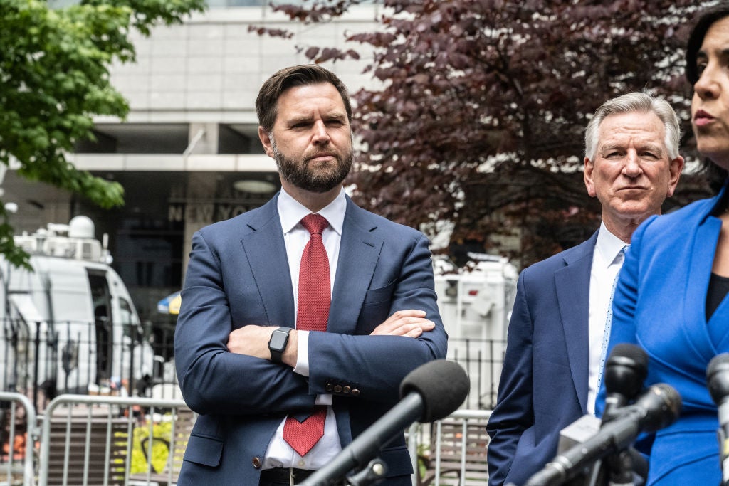 Ohio Senator JD Vance, who is set to be announced as Donald Trump’s running mate on Monday at the RNC, listens at a press conference outside Trump’s criminal trial in Manhattan.