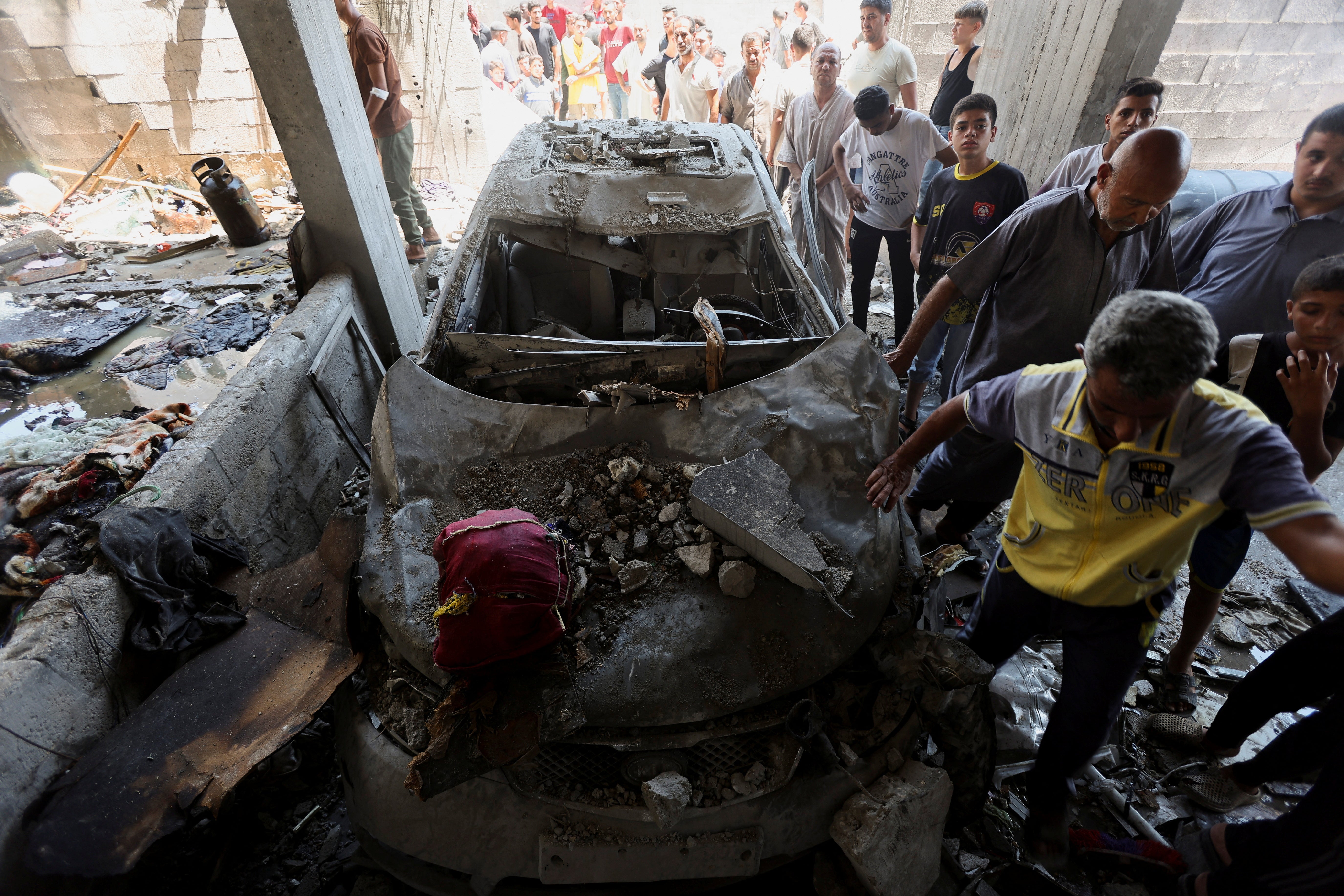 An Israeli strike on a house, in Deir Al-Balah in the central Gaza Strip on Monday