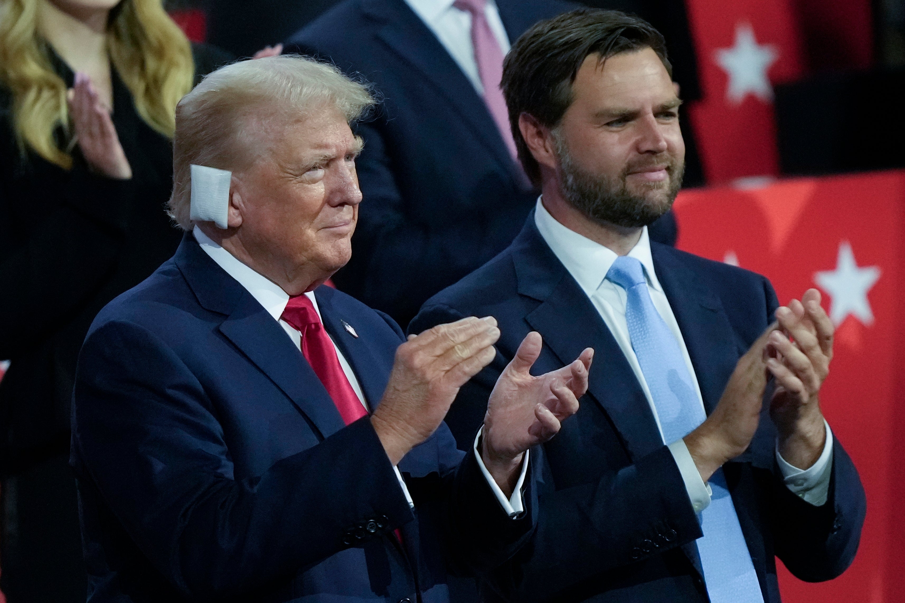 Donald Trump stands with his recently announced running mate JD Vance at the Republican National Convention in Milwaukee on July 15.