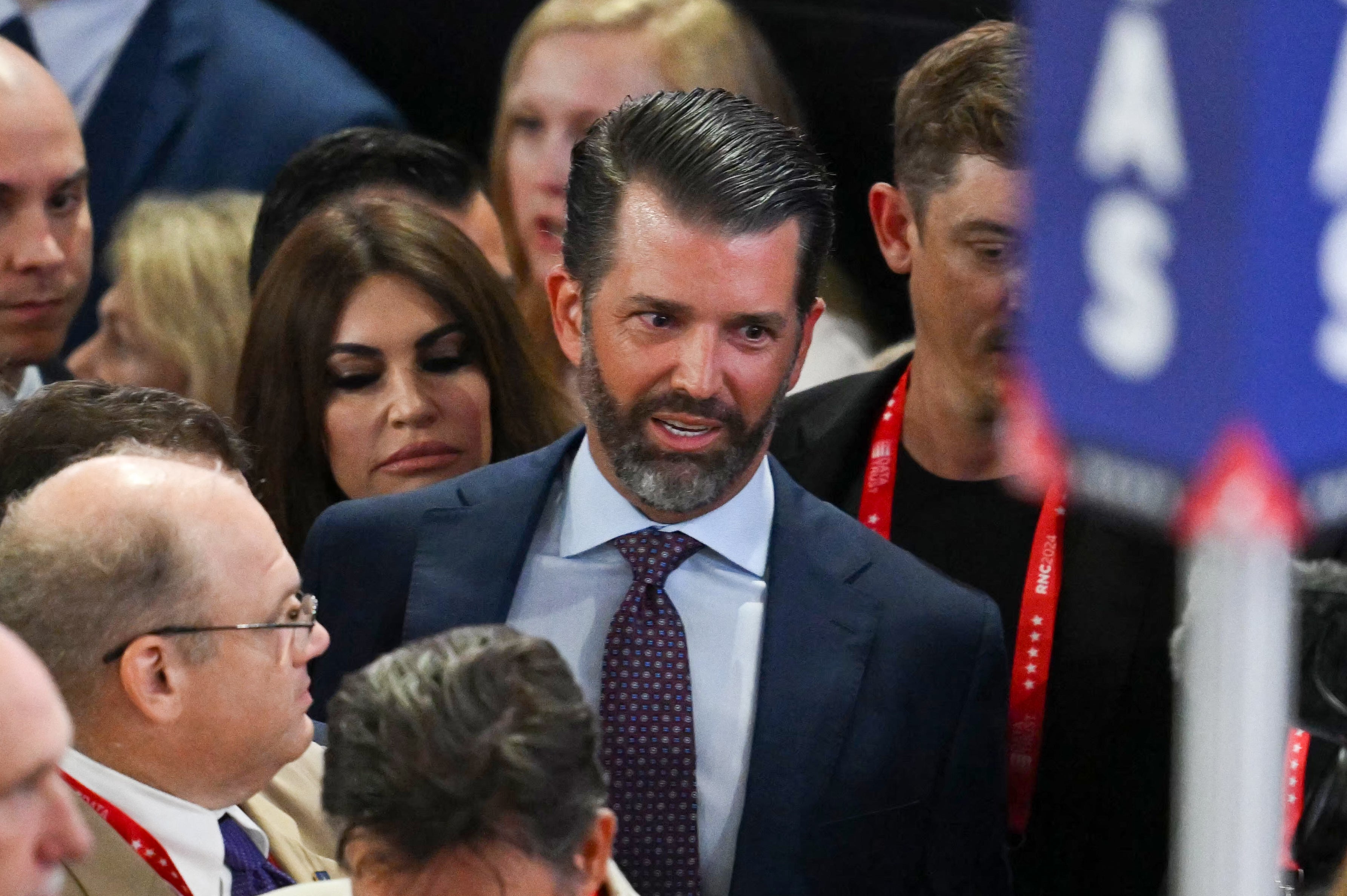 Donald Trump Jr and his fiance Kimberly Guilfoyle attend the first day of the 2024 Republican National Convention at the Fiserv Forum in Milwaukee, Wisconsin, July 15, 2024