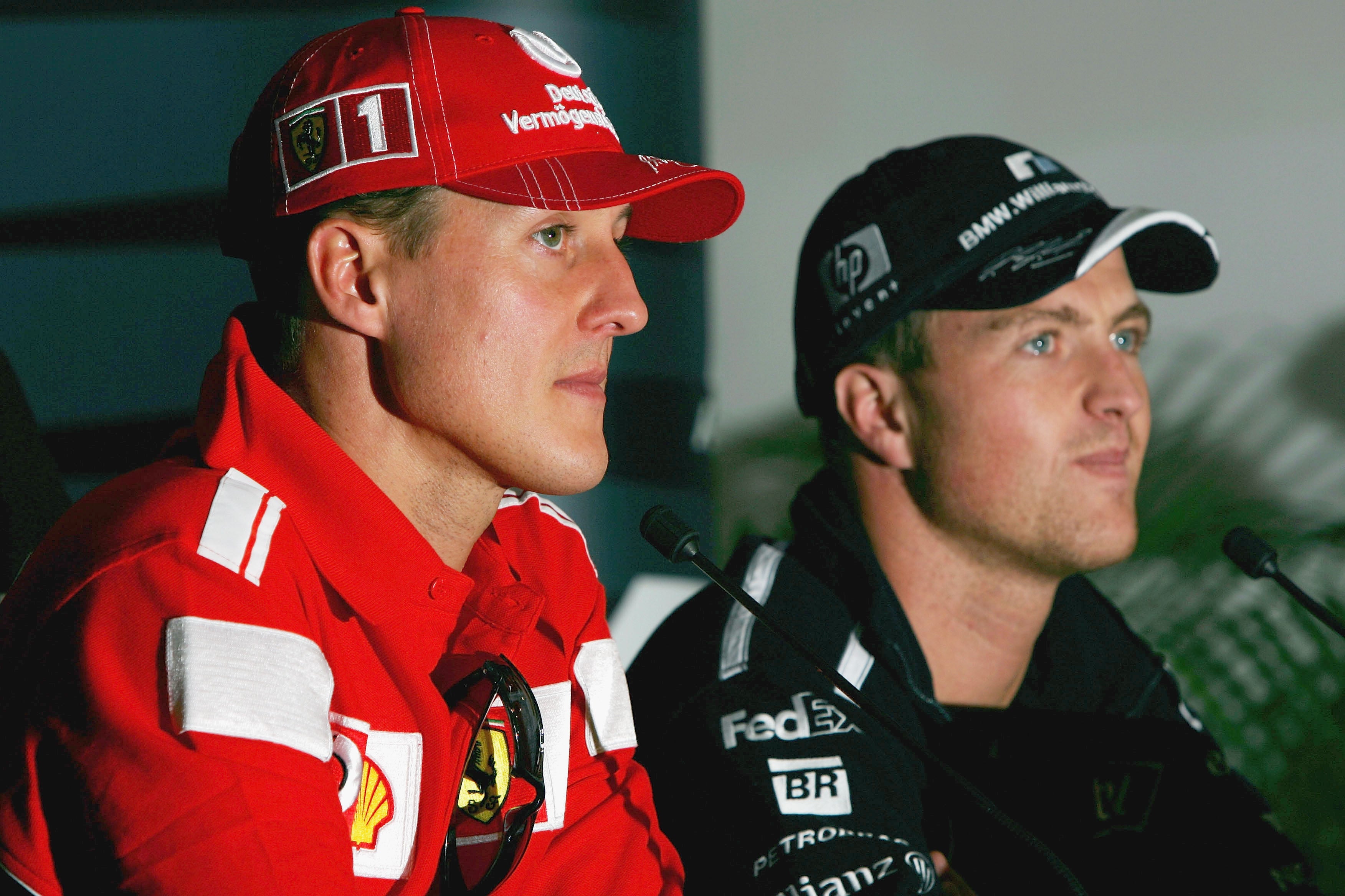 Ralf (right) is the younger brother of seven-time F1 world champion Michael Schumacher (left)