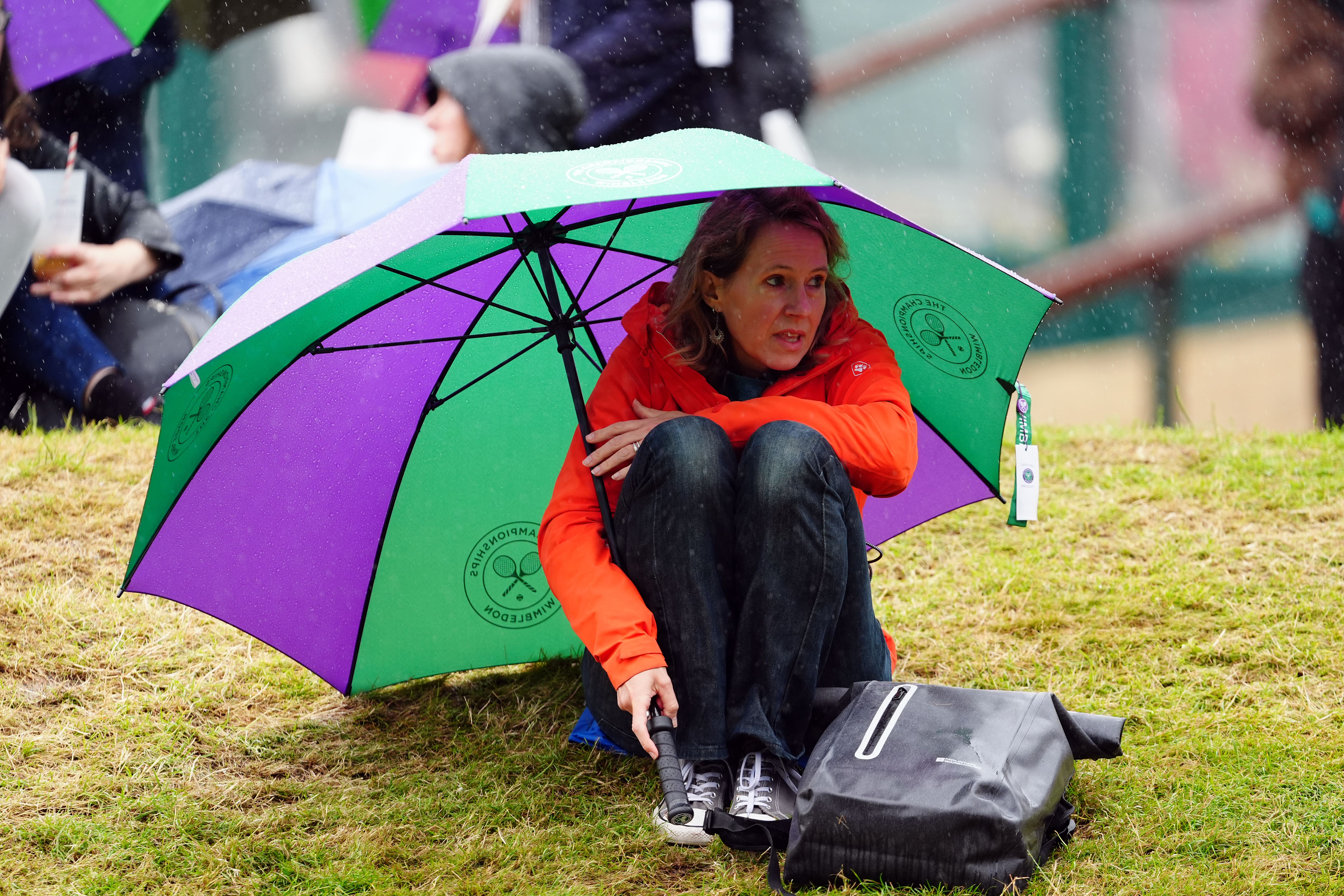 Rain at Wimbledon was part of the wet picture for the first half of the month, but 30C temperatures are forecast for some by the weekend (Mike Egerton/PA)