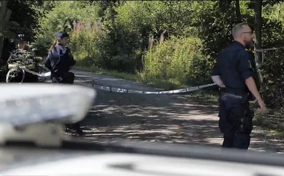 Police pictured at the scene in Malmo where two bodies were discovered