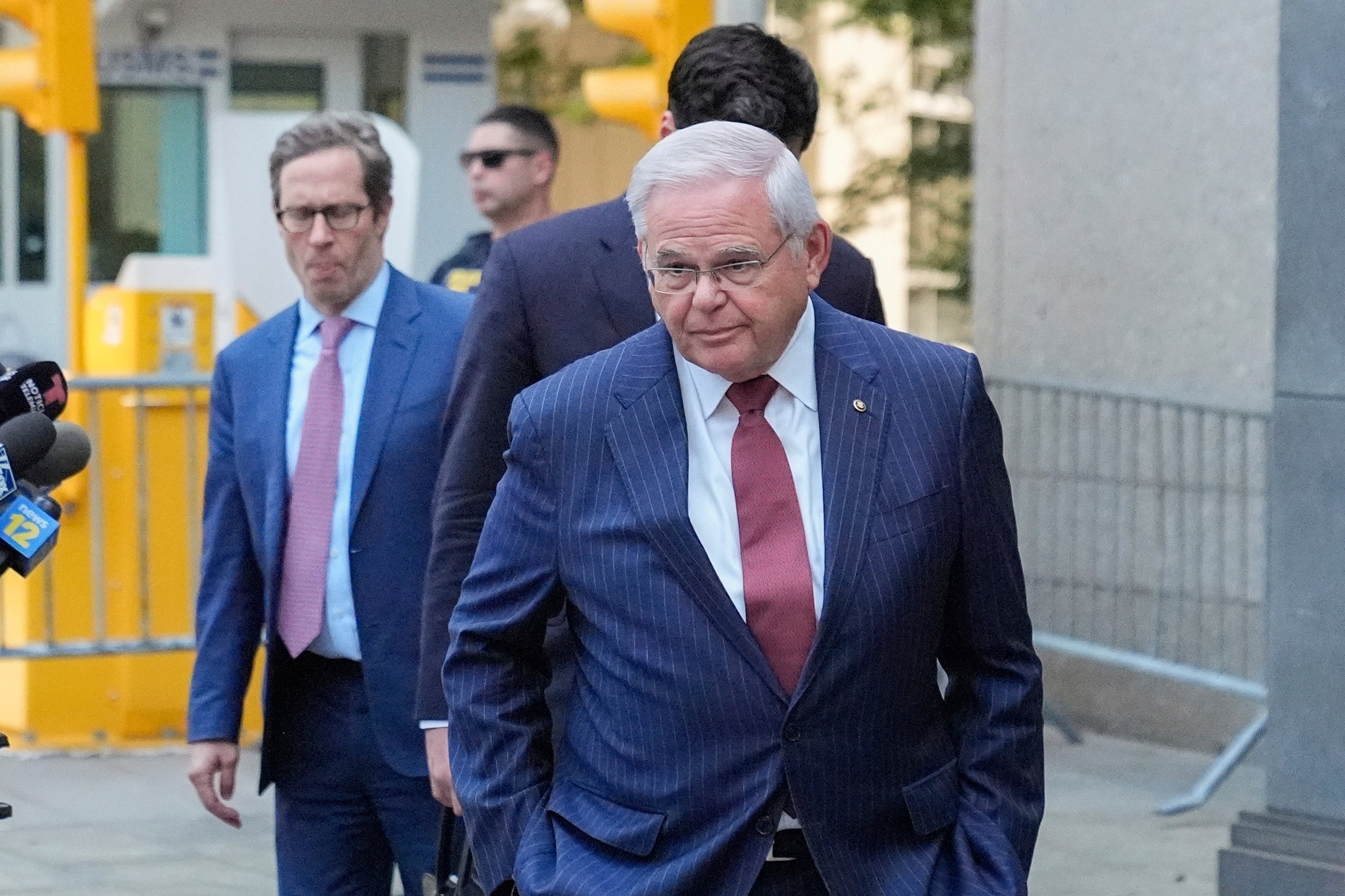 Democratic Senator Bob Menendez leave federal court on Tuesday, July 16th after being convicted on all 16 charges