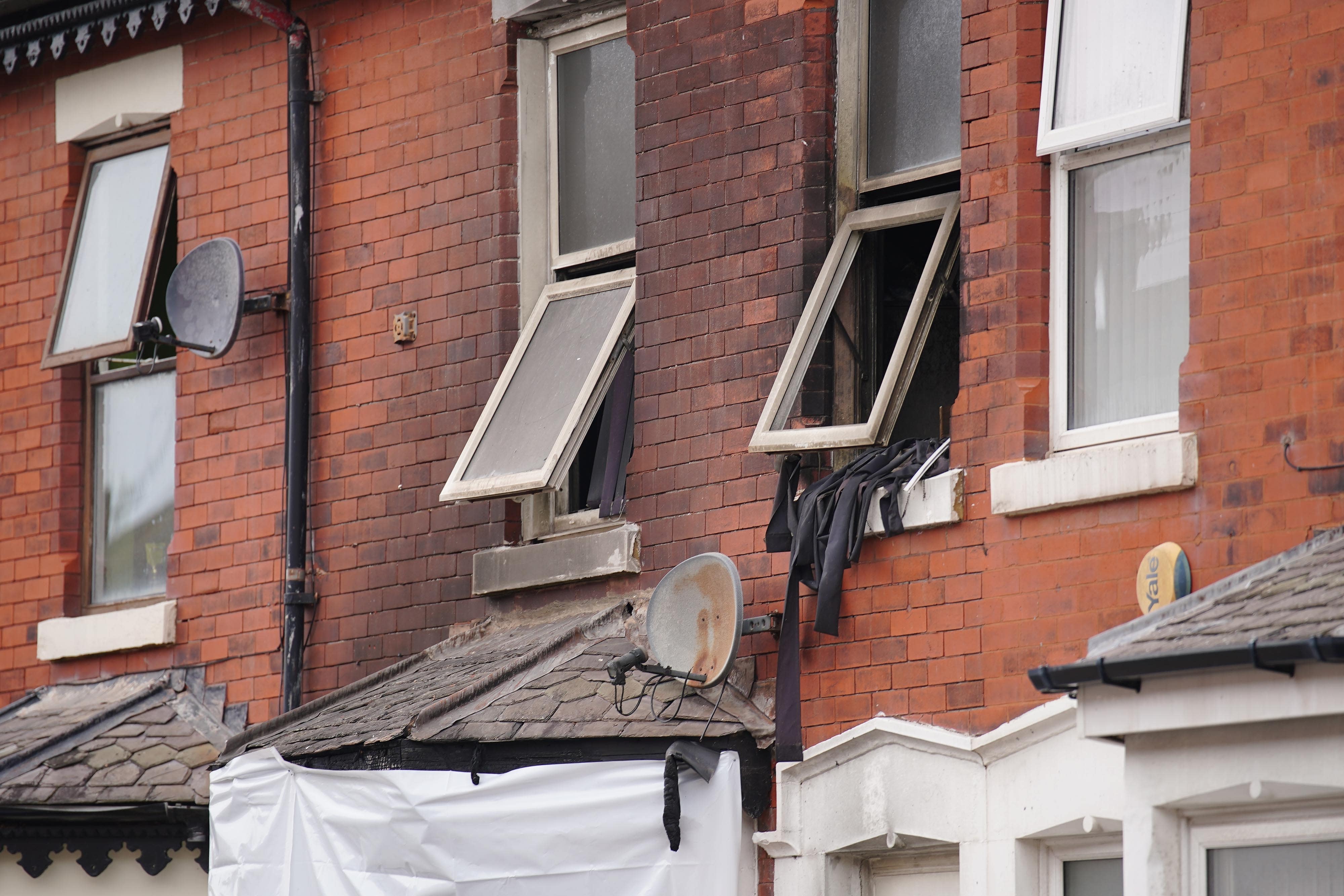 The scene of a house fire in Blackpool in which a man and a woman died (Peter Byrne/PA)