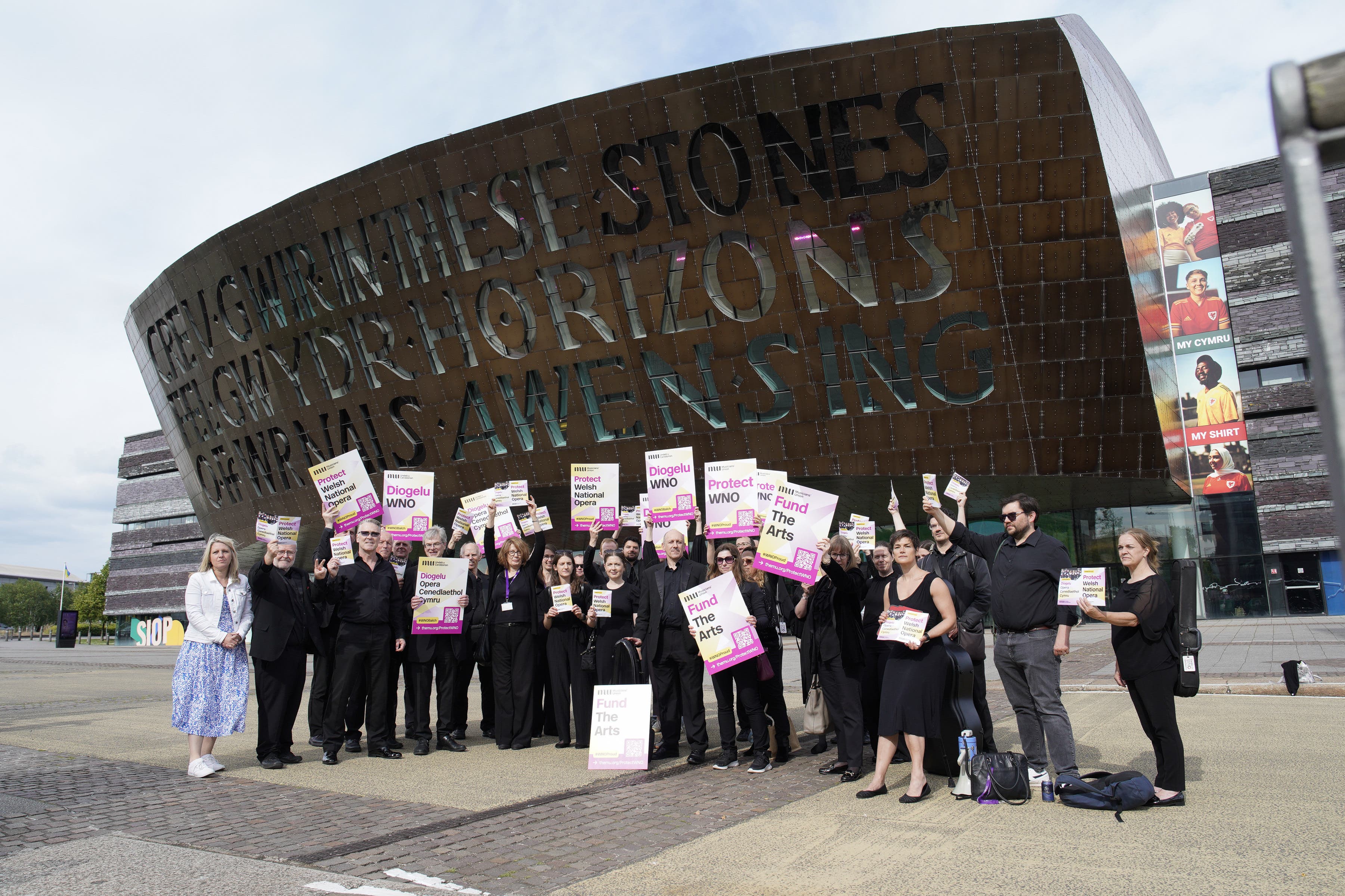 Musicians’ Union members in the Welsh National Opera orchestra demonstrating at the Wales Millennium Centre in June (Alistair Heap Media Assignments/PA)