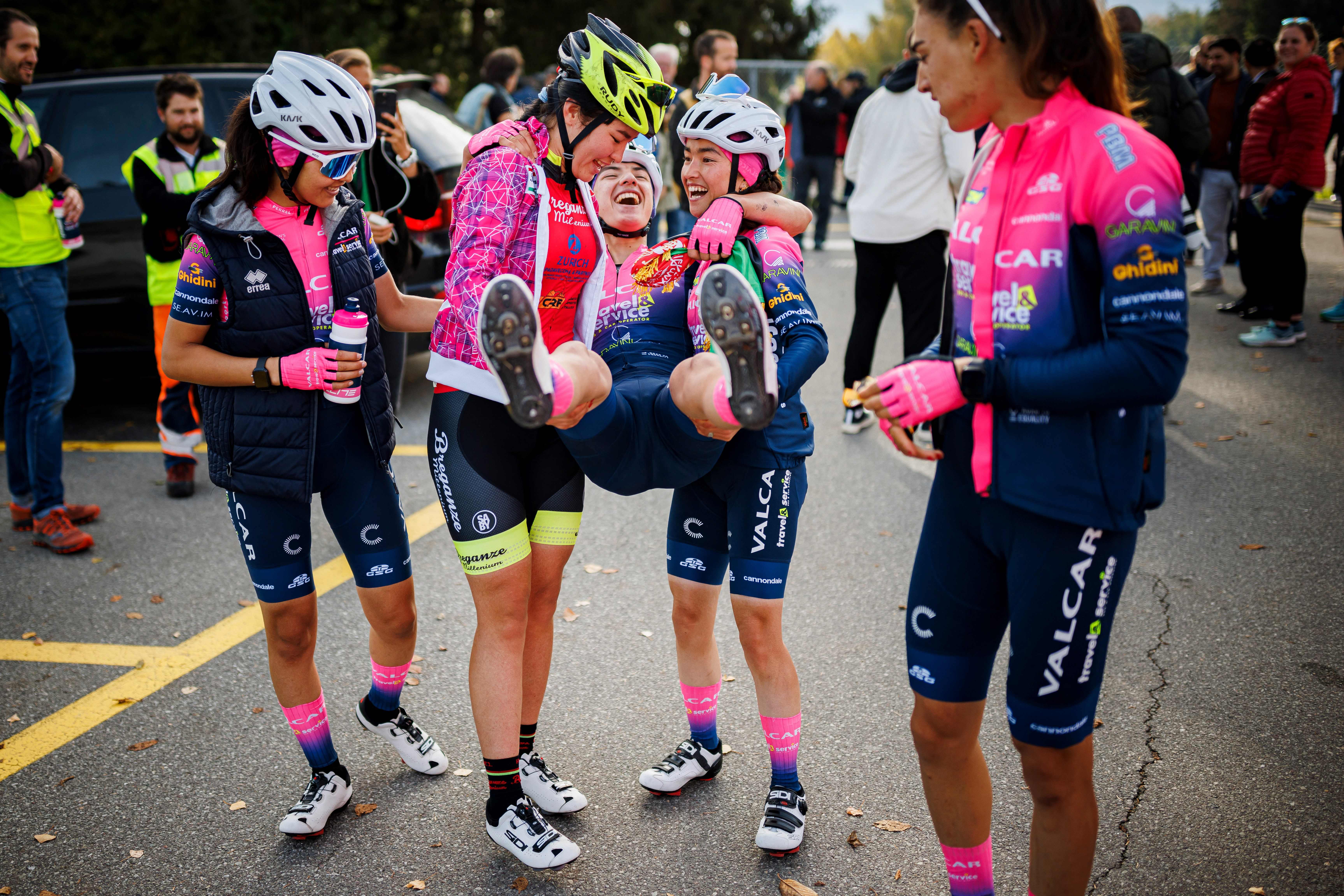 Fariba Hashimi celebrates after winning the 2022 women’s road cycling competition at the Asia Championship of Afghanistan in Aigle, Switzerland