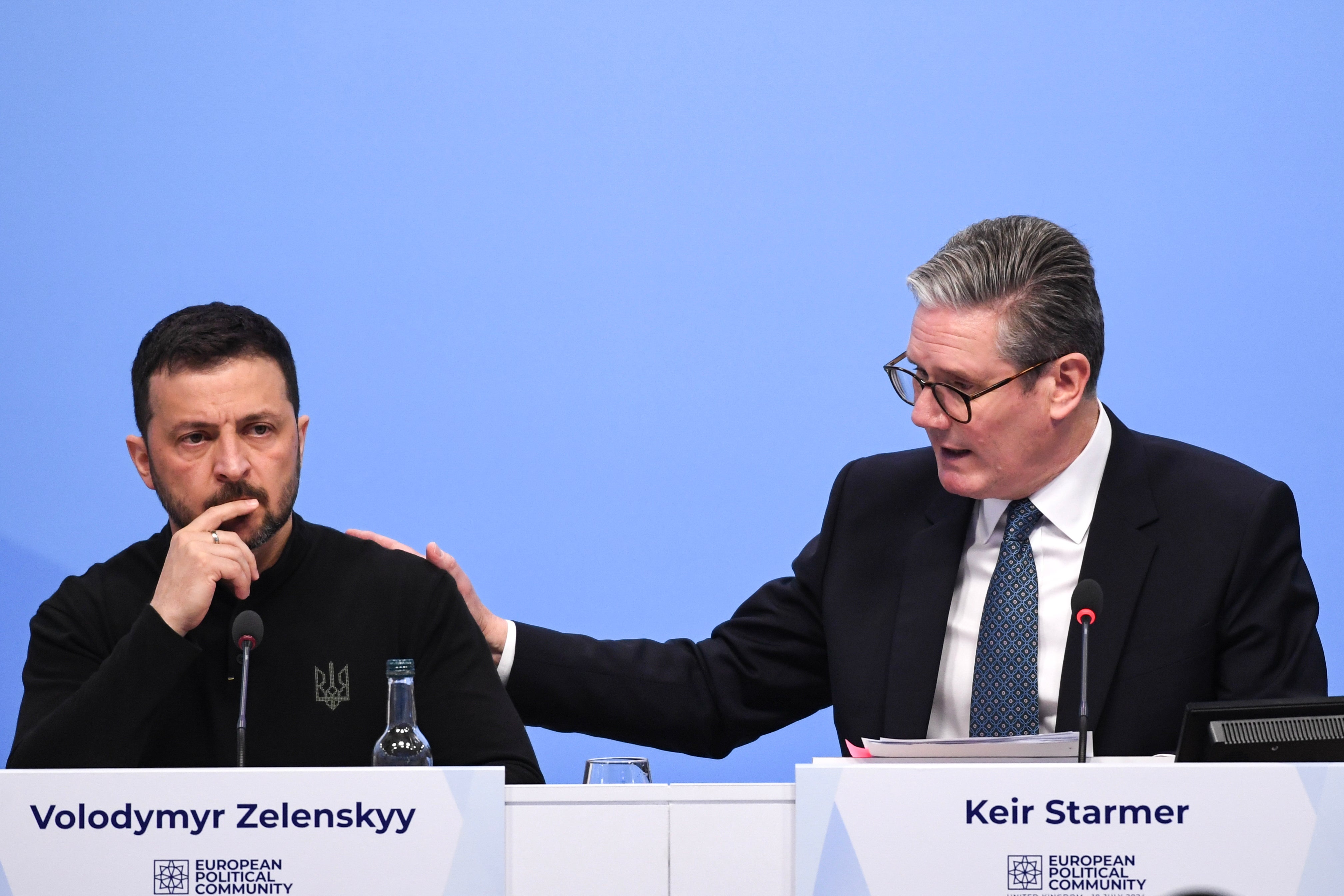 Sir Keir Starmer touched Mr Zelensky’s shoulder as he highlighted the Ukrainian leader’s comments calling for more air defences to protect children as they return to school