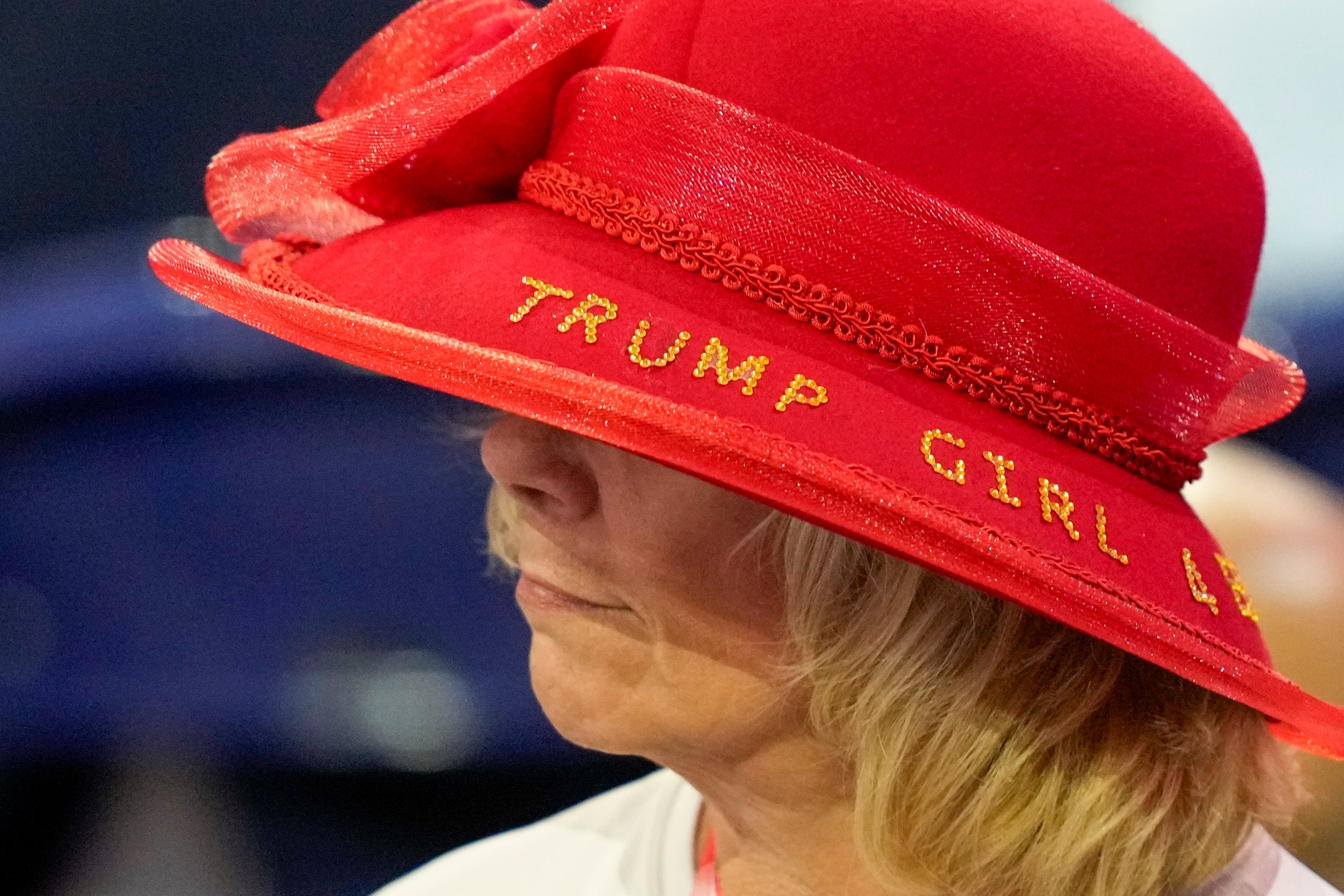 A Missouri delegate wearing a wide-brimmed hat with the words ‘Trump Girl’ emblazoned on it