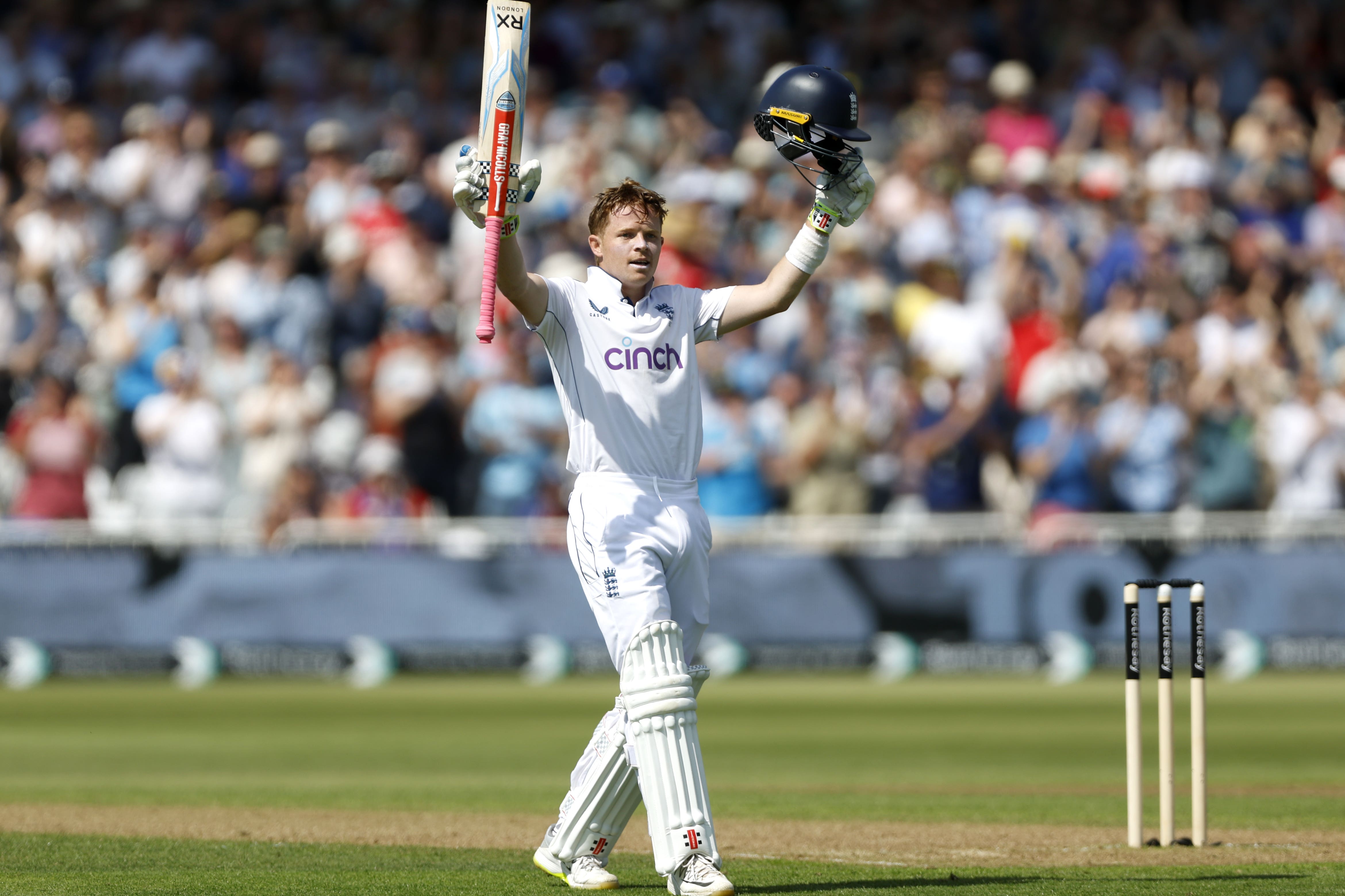 England’s Ollie Pope celebrates 100 runs during day one at Trent Bridge (Nigel French/PA)