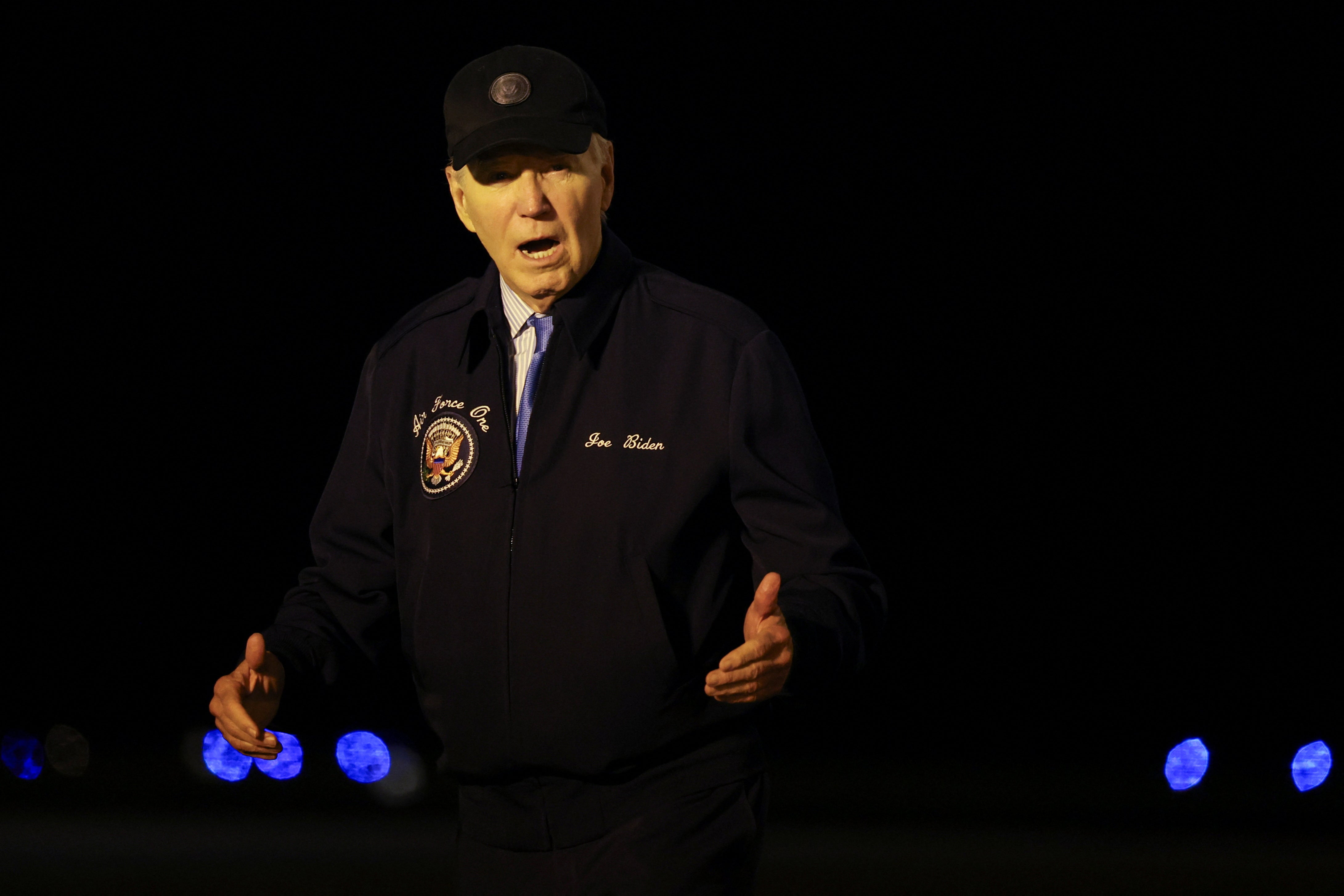 President Joe Biden walks after deboarding from Air Force One, at Dover Air Force Base in Dover, Delaware after testing positive for Covid-19