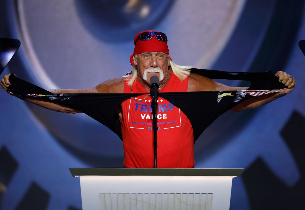 Hulk Hogan, retired wrestling star, rips off his tank top to reveal a Trump/Vance shirt underneath at the RNC on the final night in Milwaukee, Wisconsin