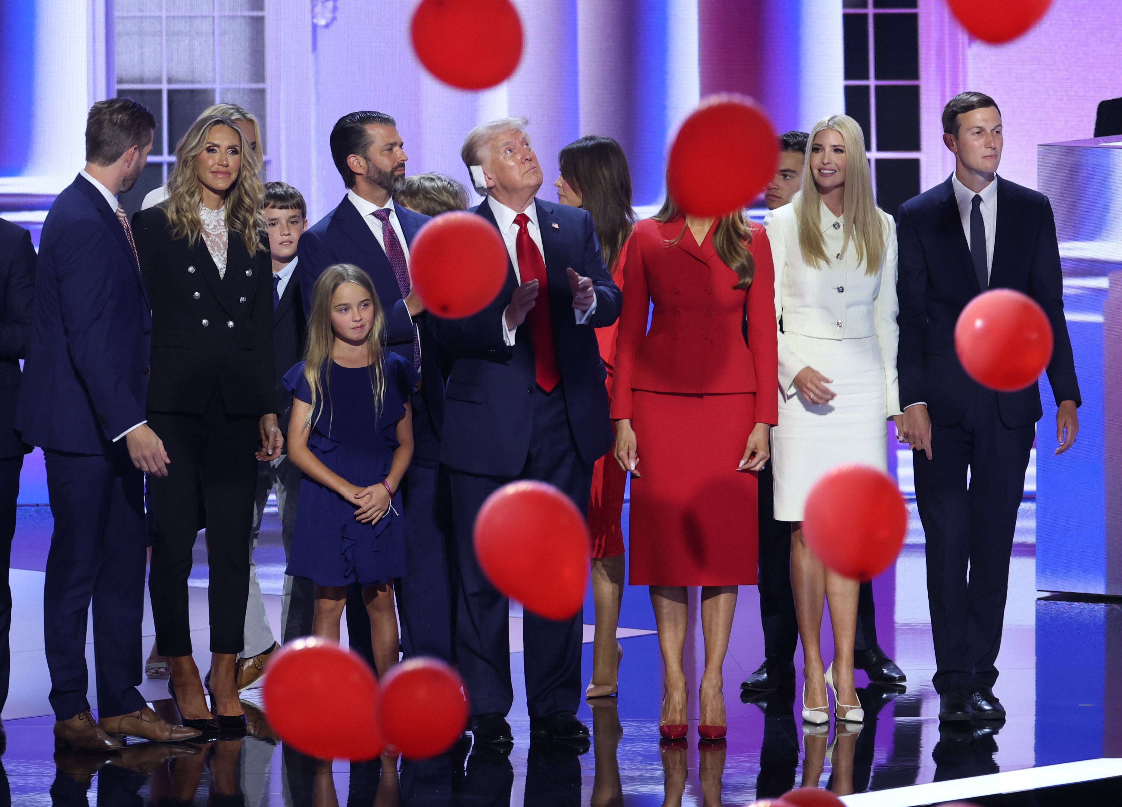 Republican presidential nominee and former U.S. President Donald Trump is joined on stage by his wife Melania and other members of his family