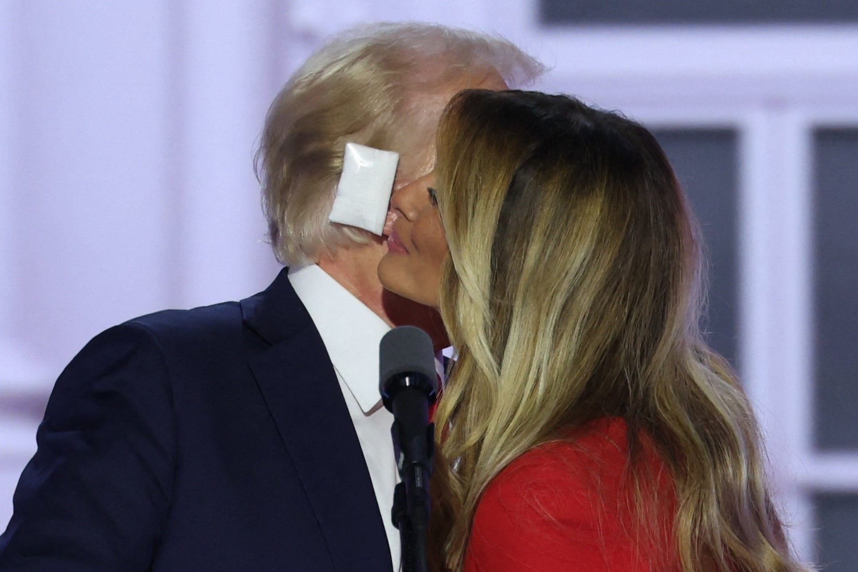 The former first lady offered her husband a brief peck on the cheek as he concluded his mammoth acceptance speech on Thursday night at the convention