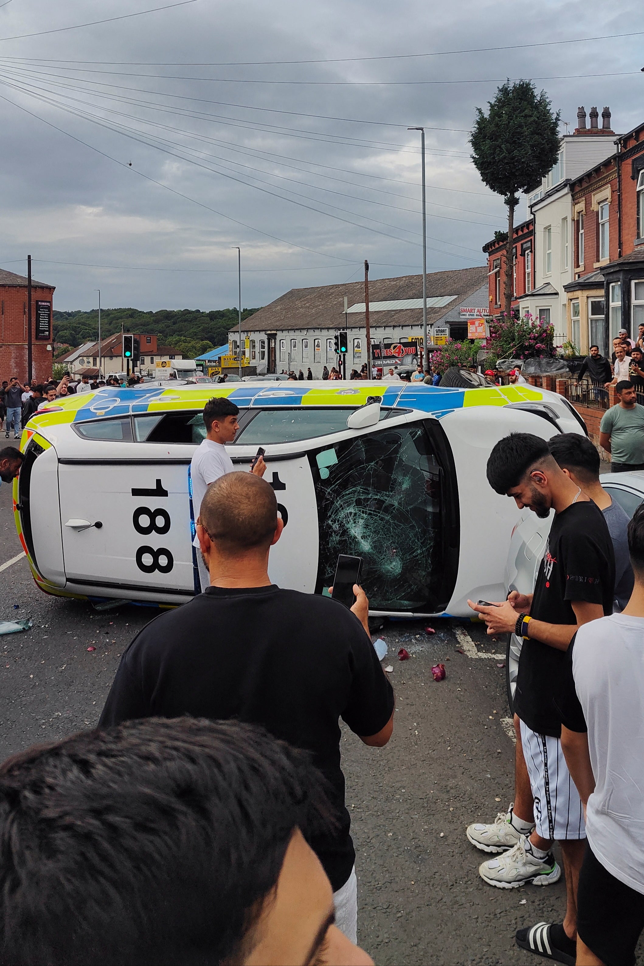 A police car was overturned as part of the disorder