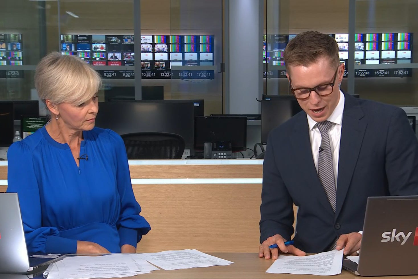 Sky News presenters reading from a script on the news channel before it was knocked off air for the second time on Friday morning (Sky News)