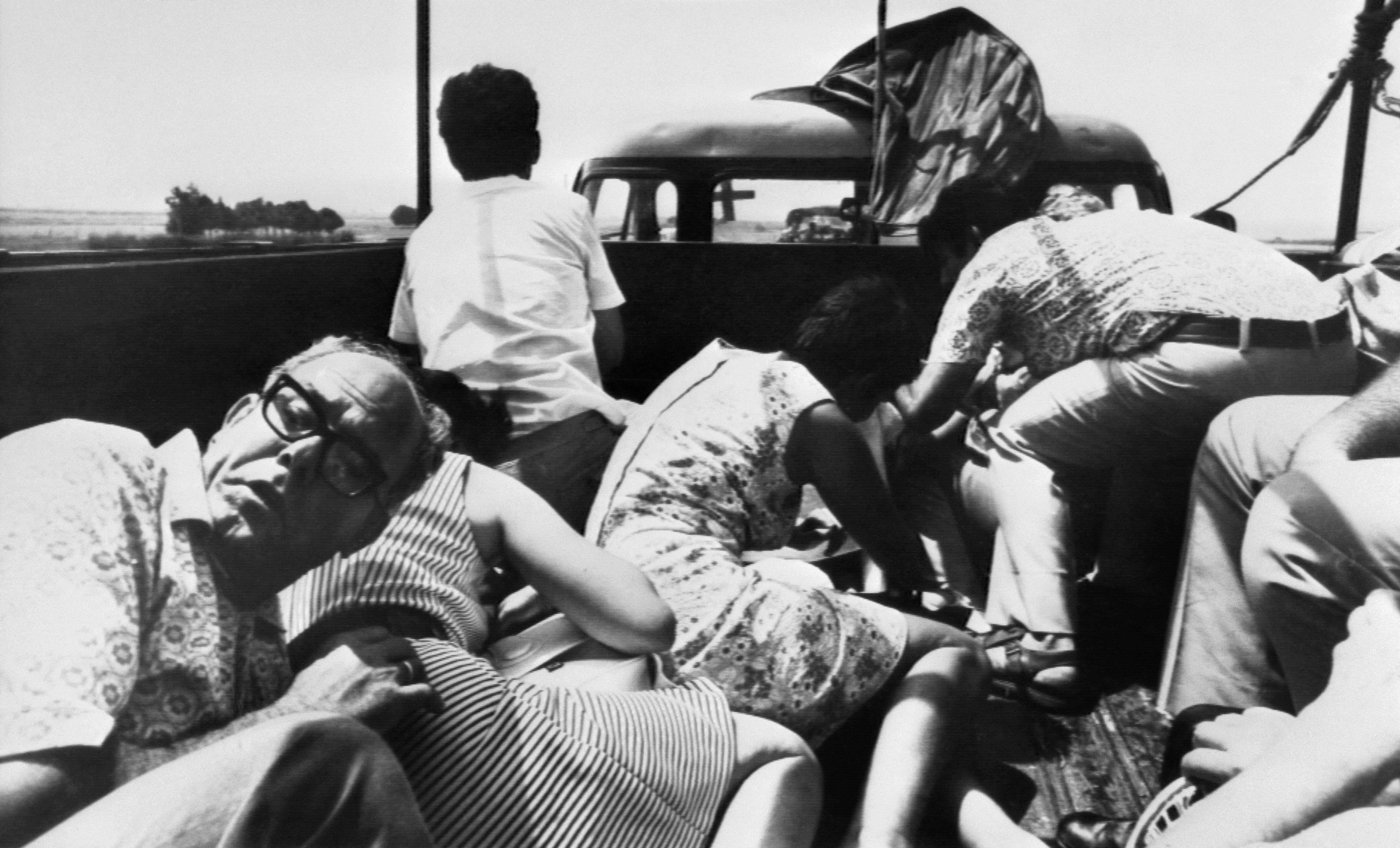 Civilians take cover in a truck during a shooting near Nicosia in 1974