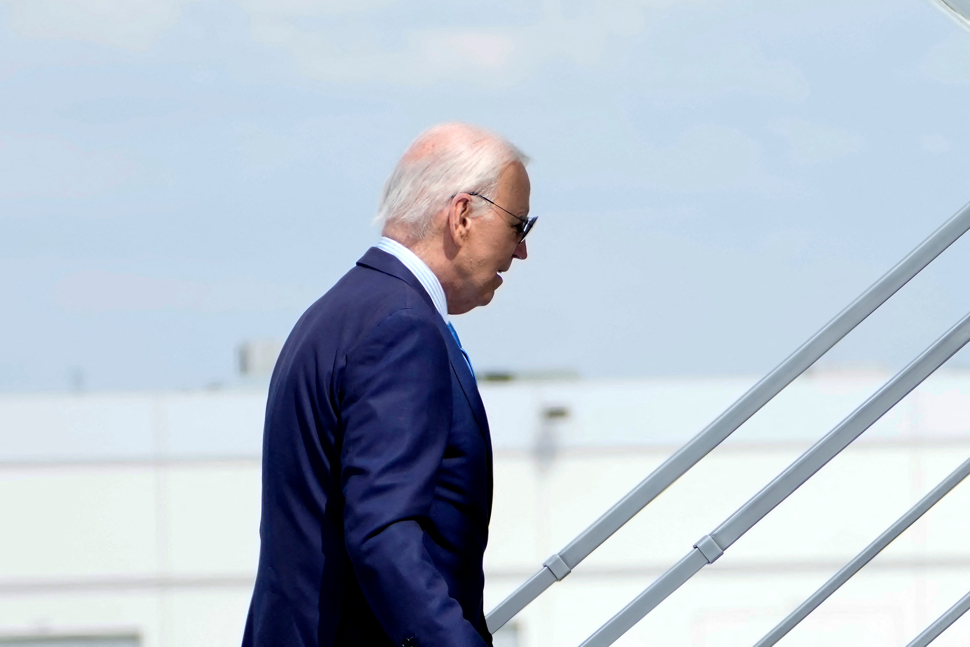 Joe Biden boards Air Force One in Las Vegas on July 17 after being diagnosed with COVID-19