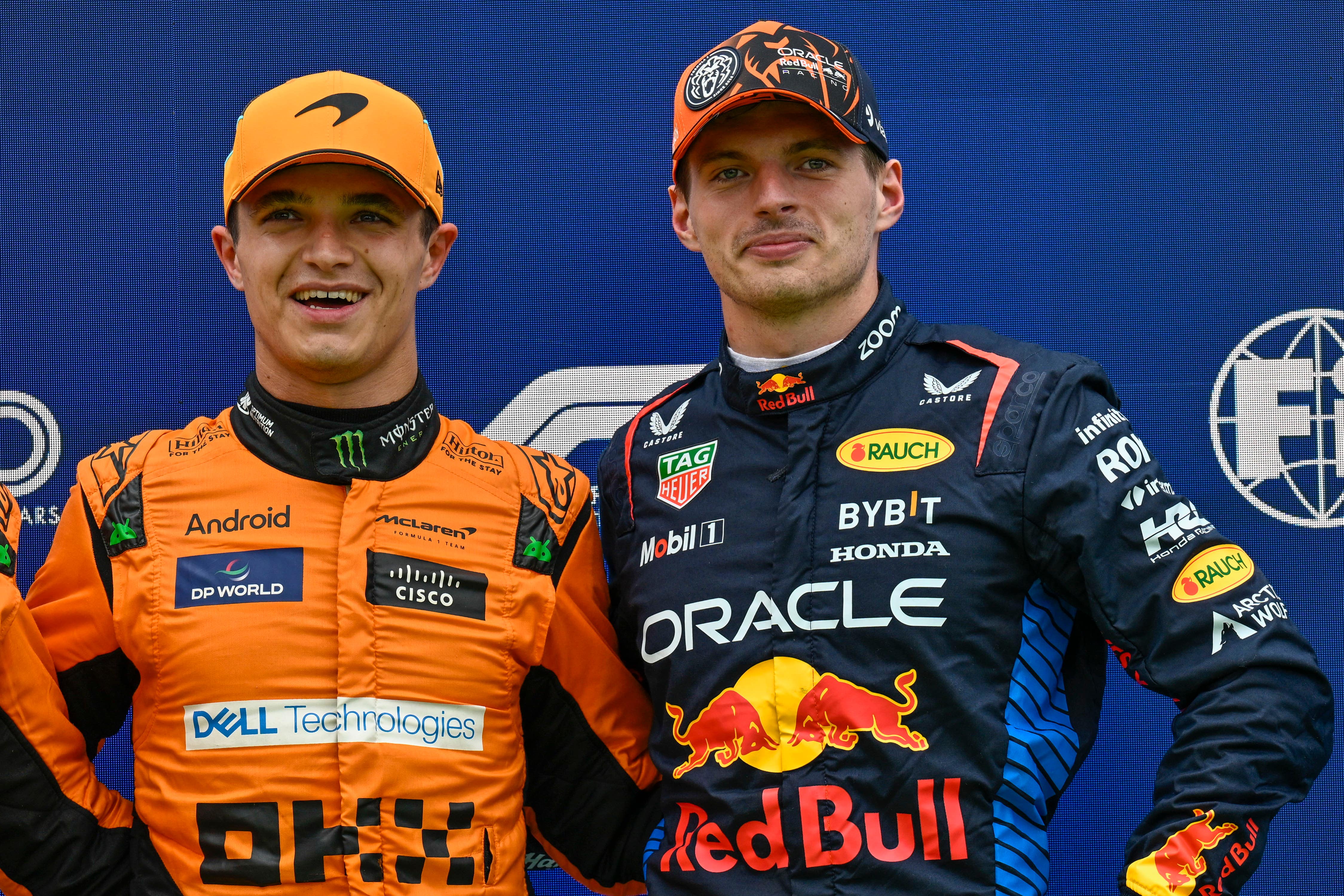 Lando Norris (centre) celebrates securing pole for the Hungarian Grand Prix (Denes Erdos/AP)